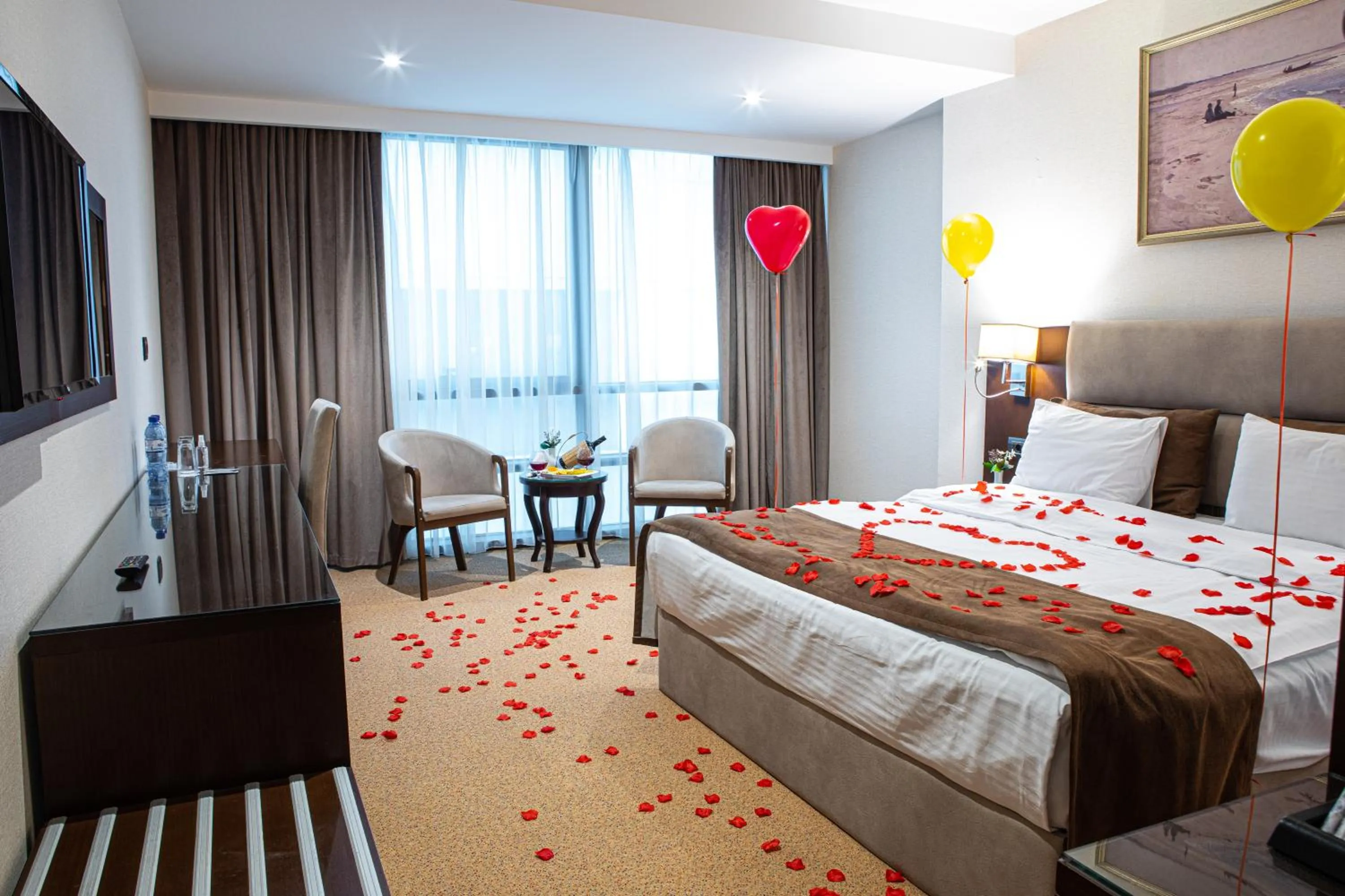 Communal lounge/ TV room in The Diamond Hotel Baku