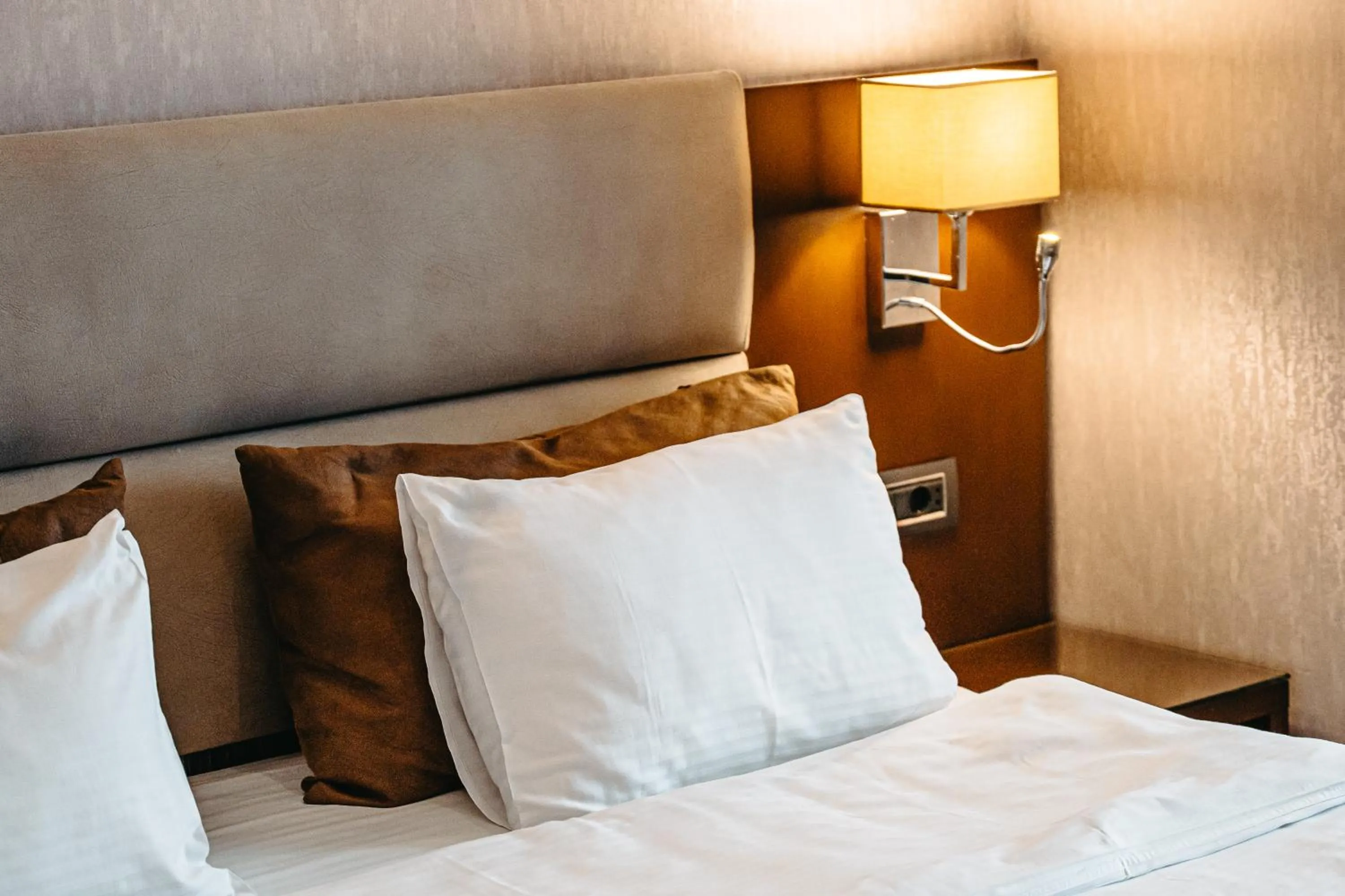 Bed in The Diamond Hotel Baku