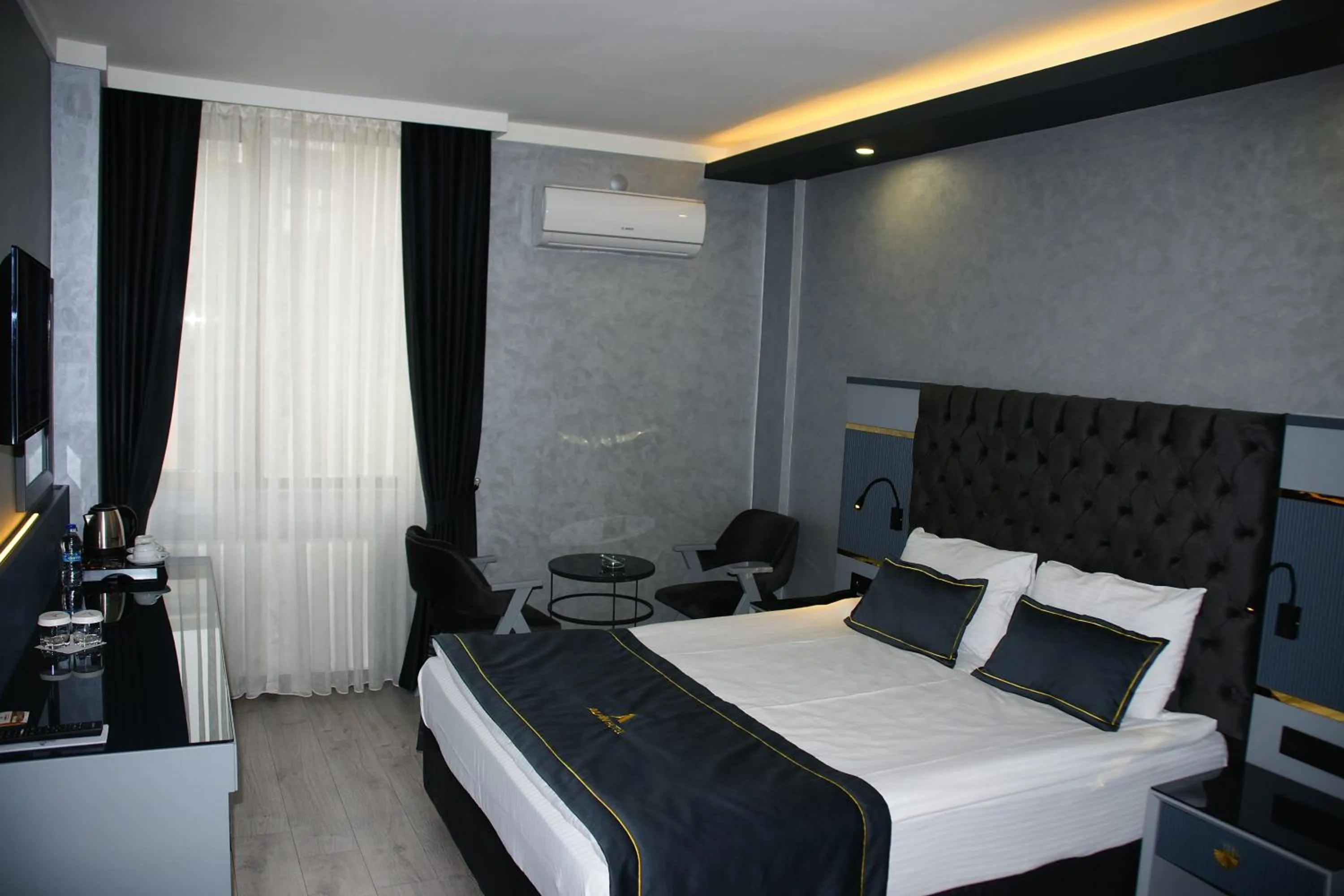Photo of the whole room, Bed in alfin otel