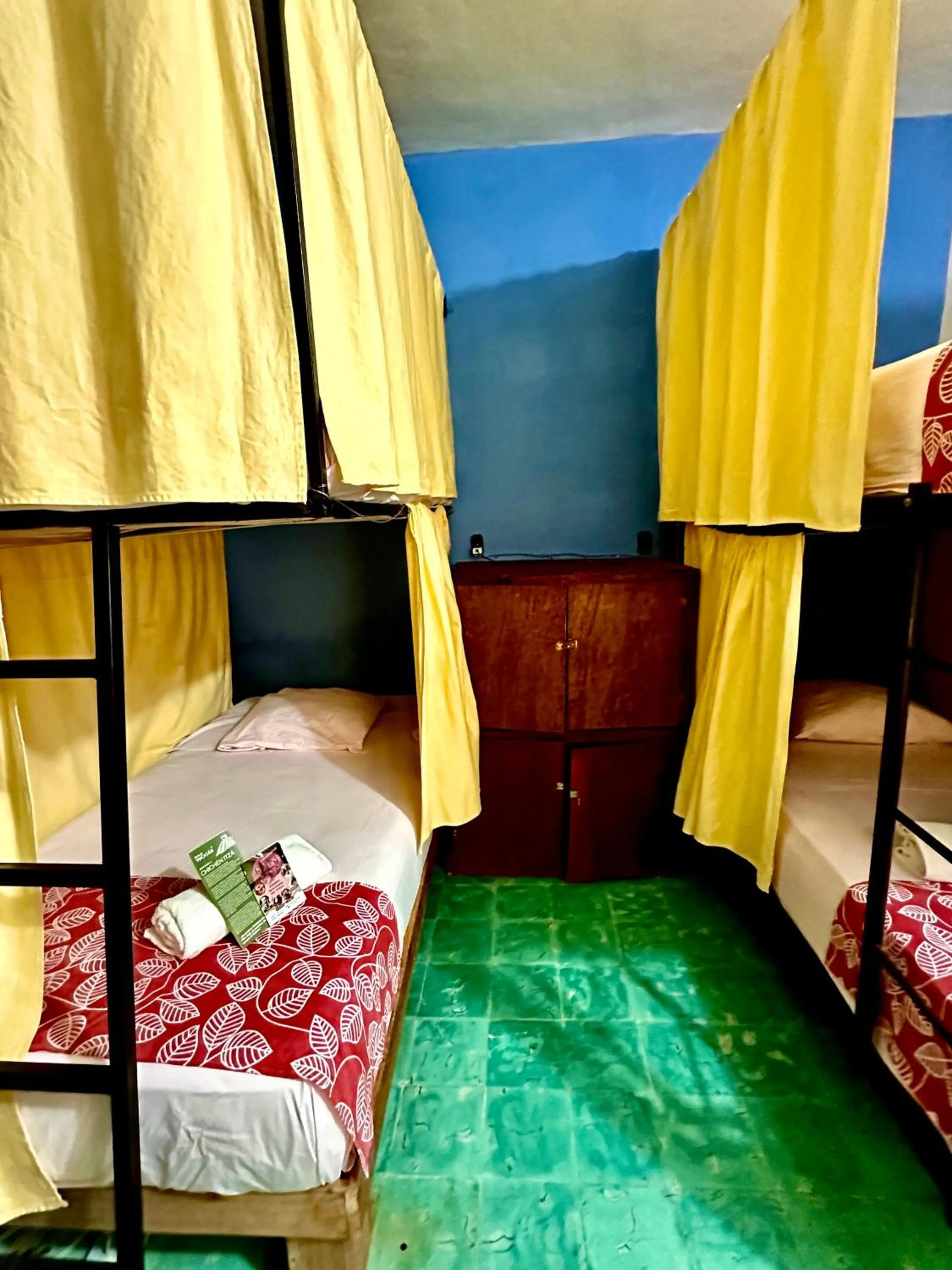 Bed in Guacamayas Hostel and Social Laundry