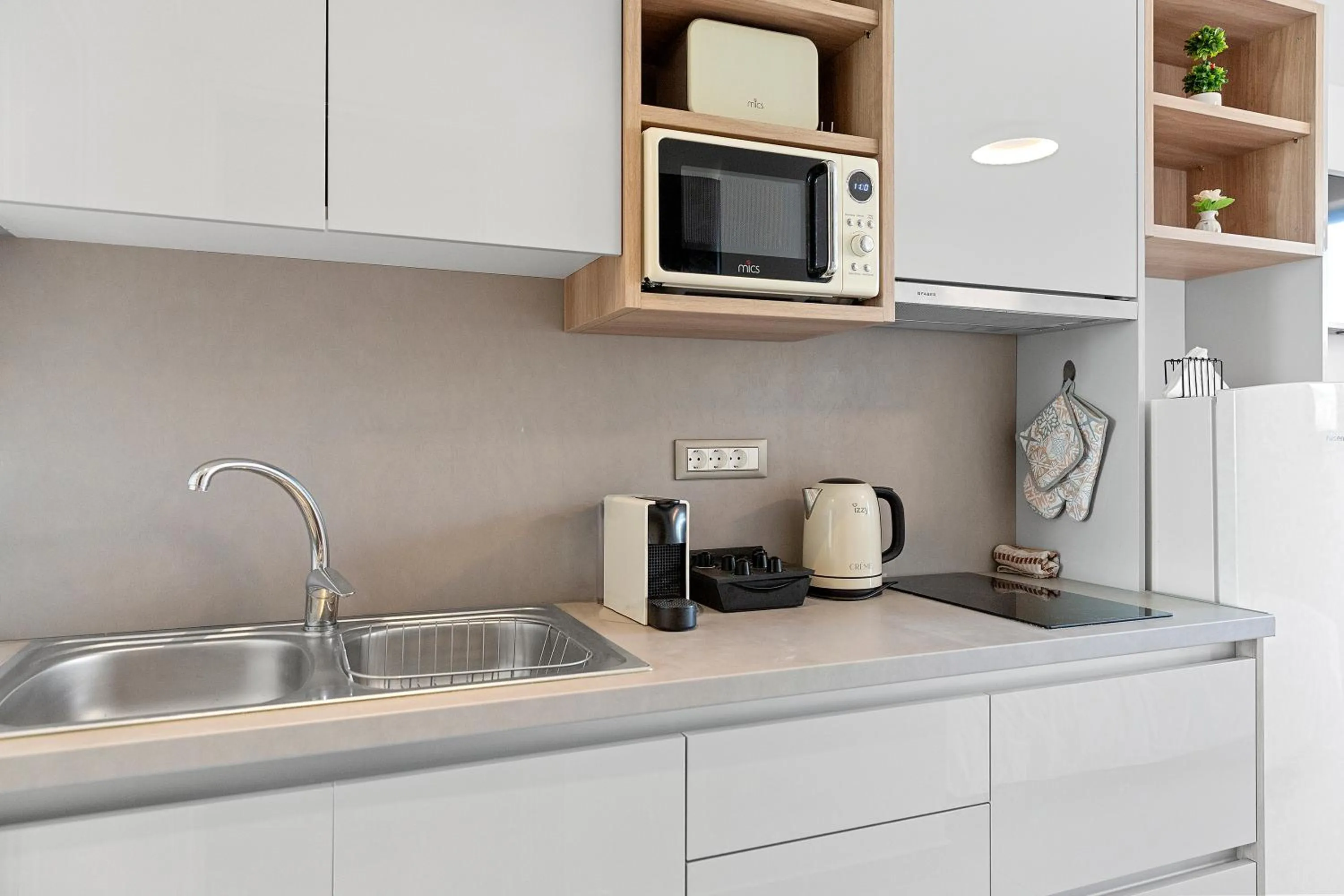 kitchen in KOUROS STONE SUITES