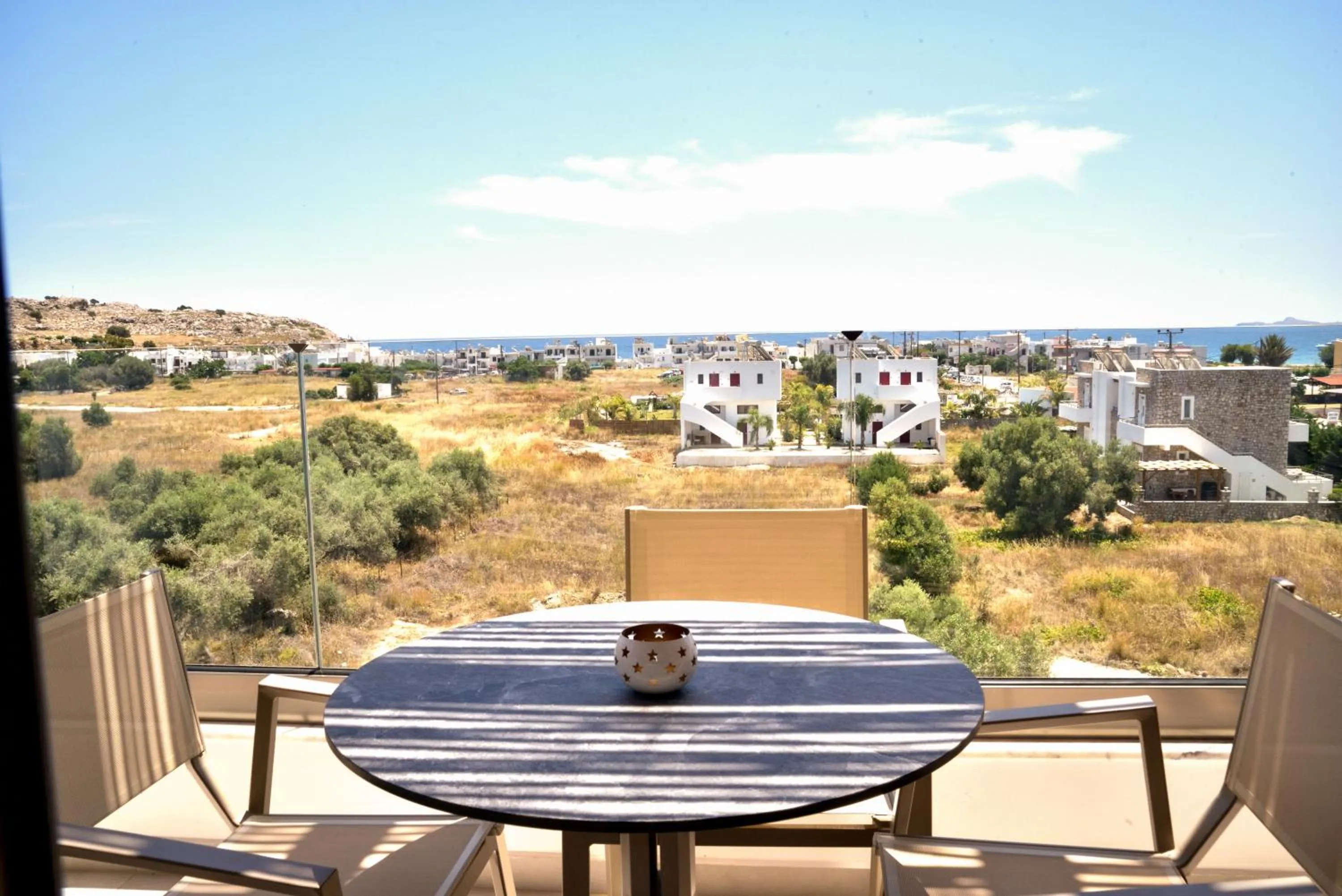 Property building in KOUROS STONE SUITES