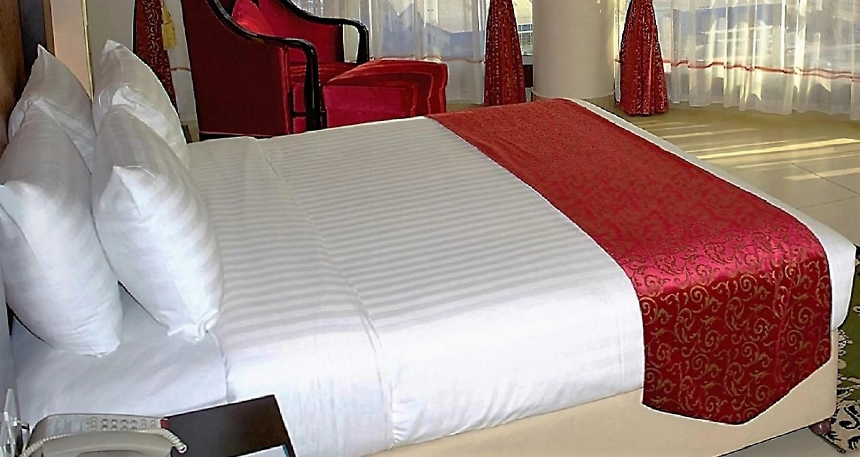 Bed in Royal Phoenicia Hotel