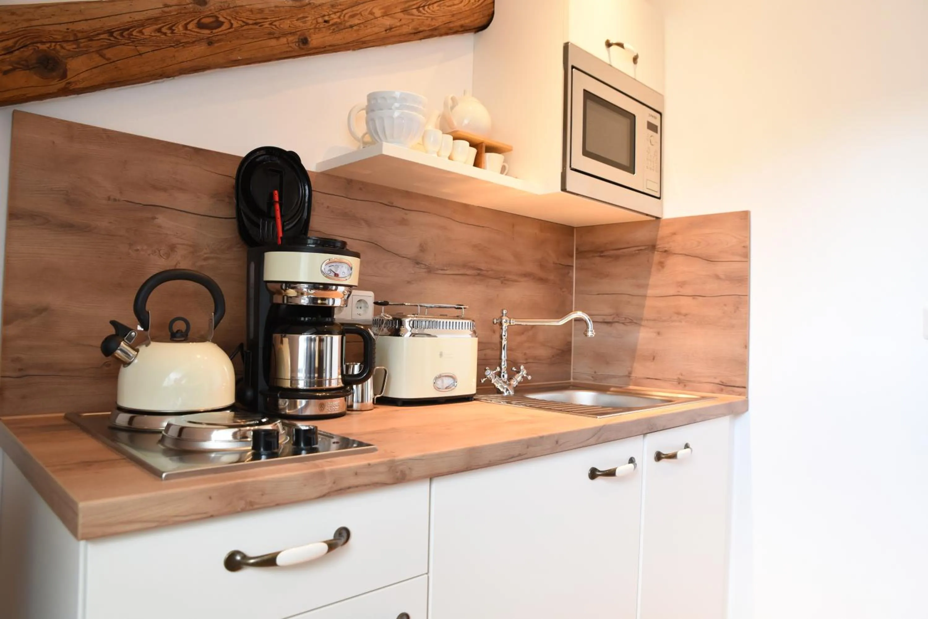 Kitchen or kitchenette in GoldGemäuer Appartements