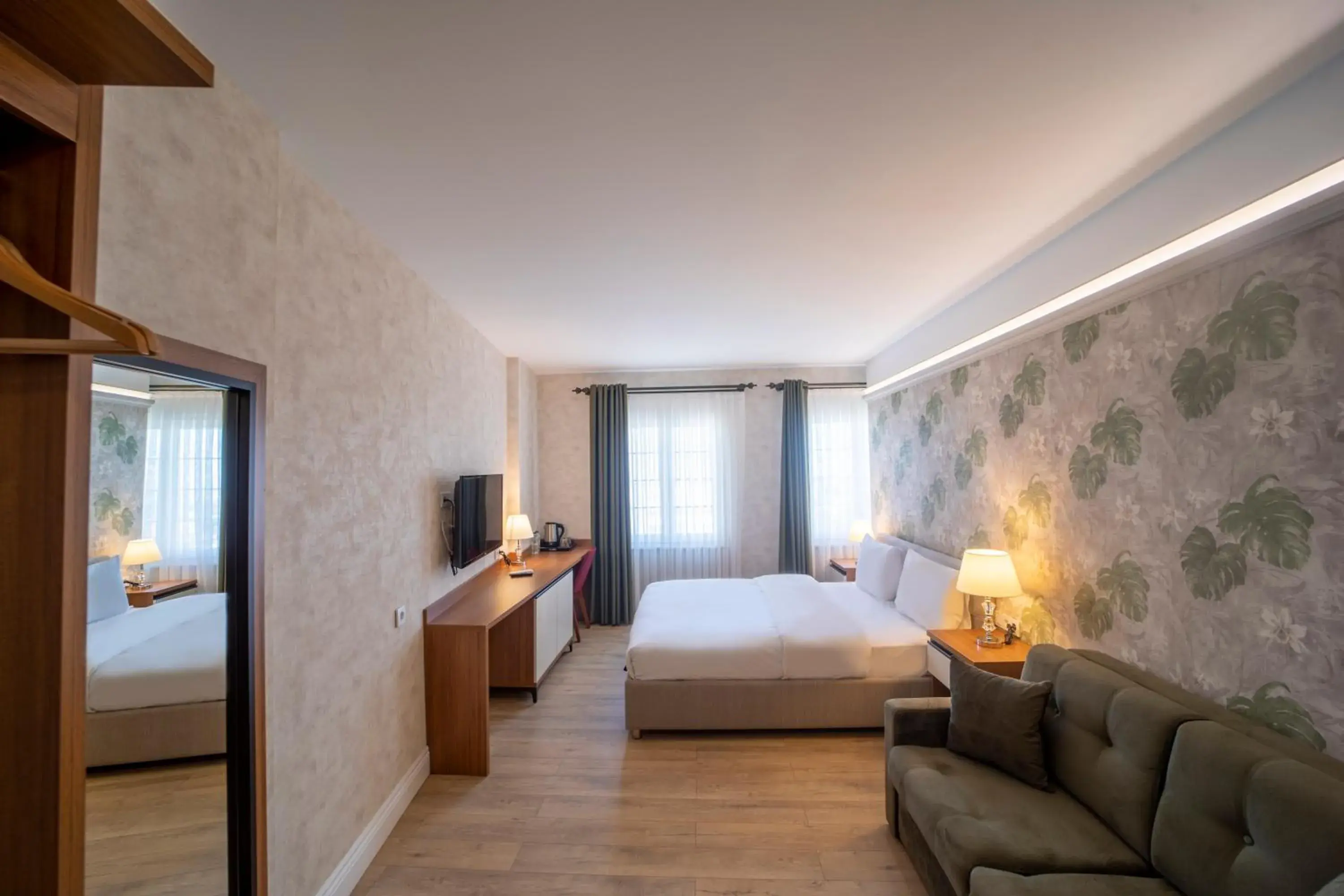 Bed in MELL City Suites Hotel Bed in MELL City Suites Hotel