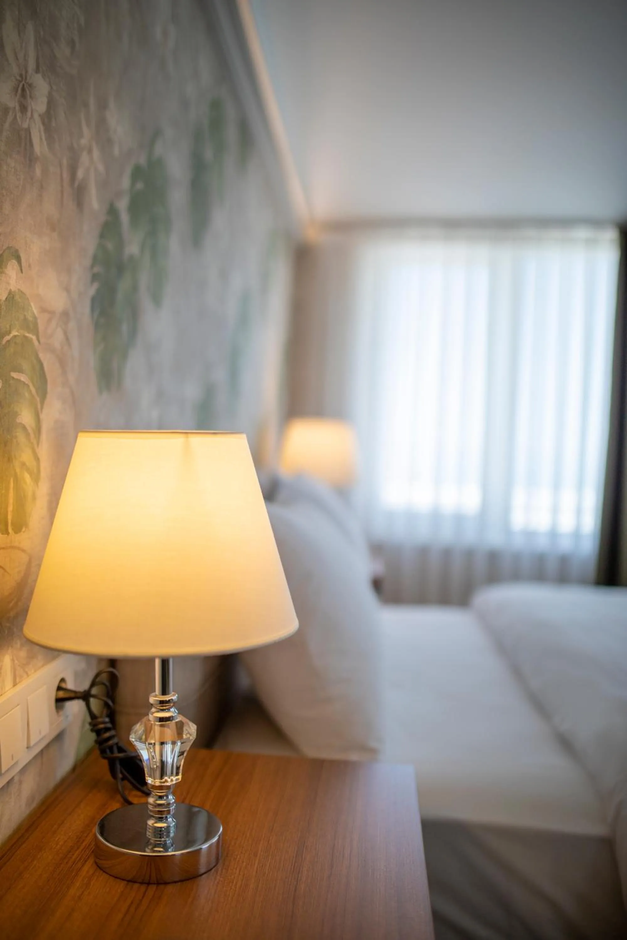 Bed in MELL City Suites Hotel