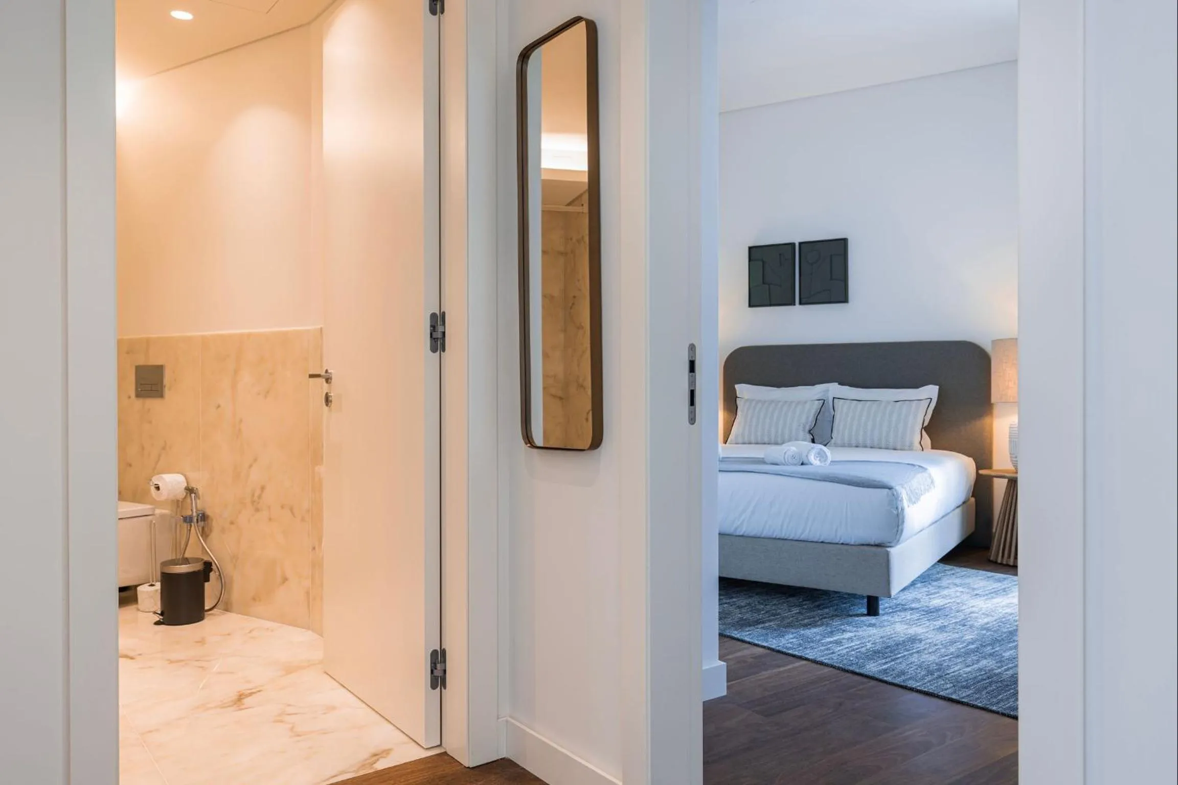 Toilet, Bed in Radiant Apartment in City Center by LovelyStay