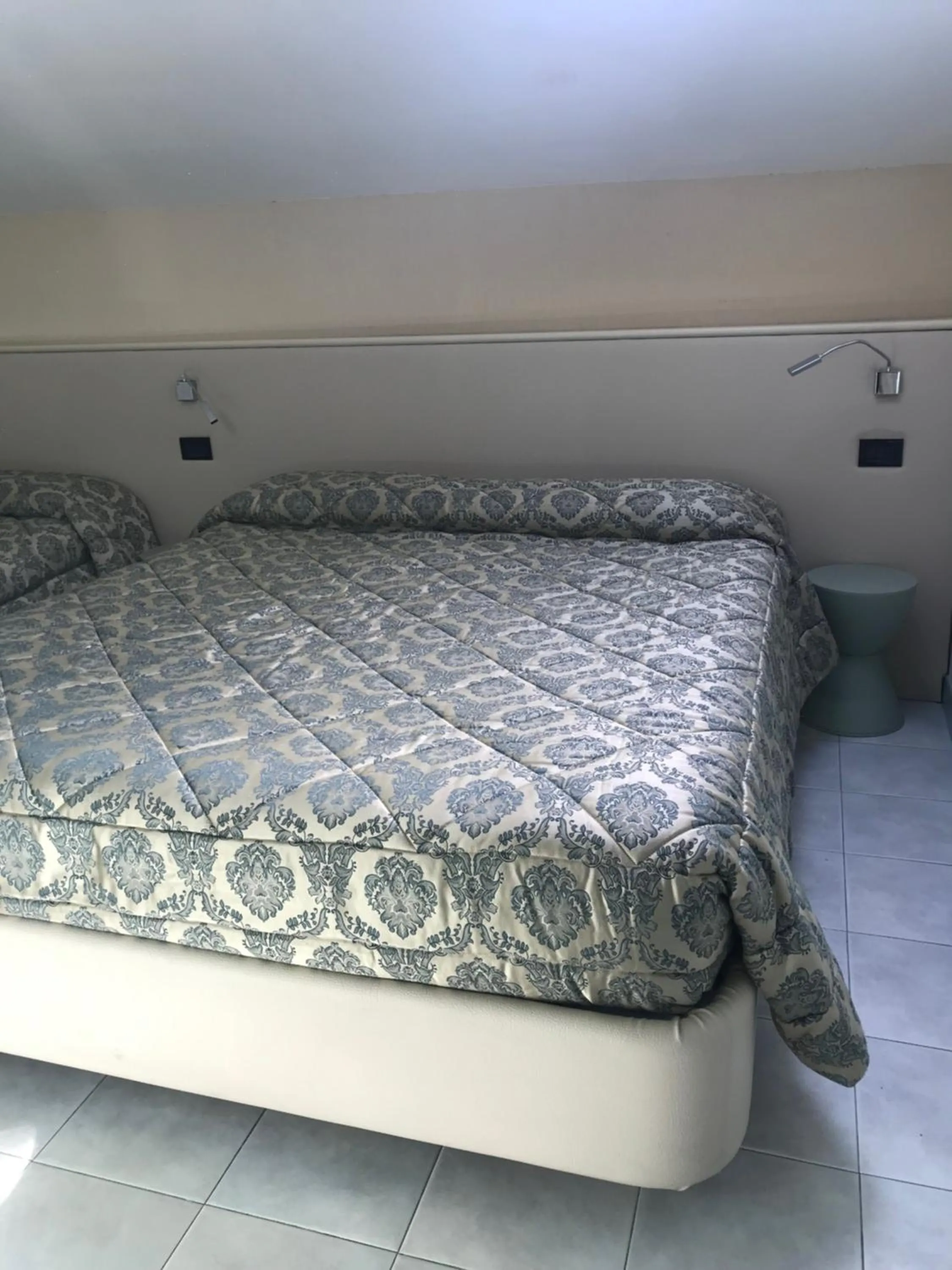 Bed in Hotel Eros Residence