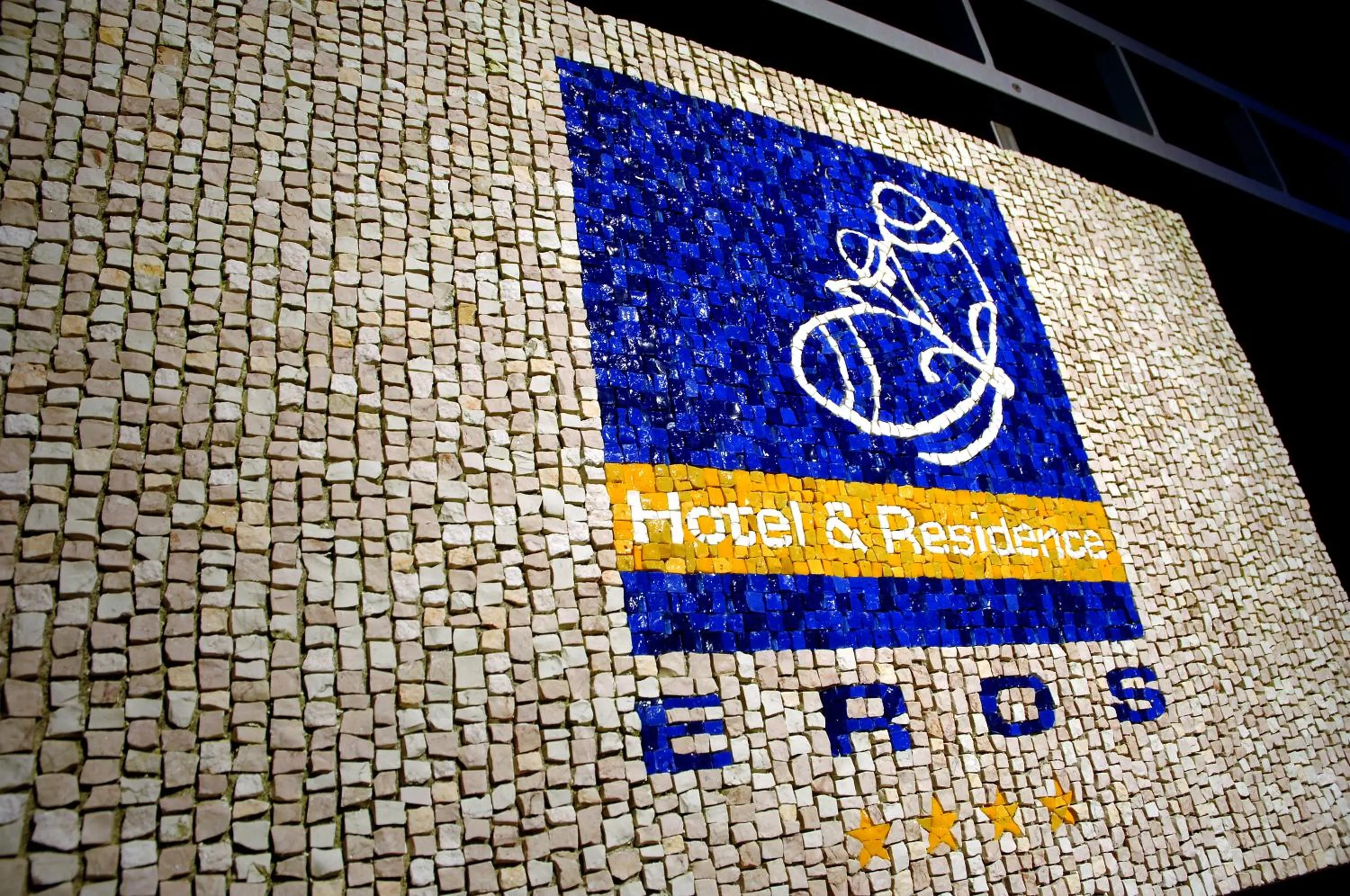 Property logo or sign in Hotel Eros Residence