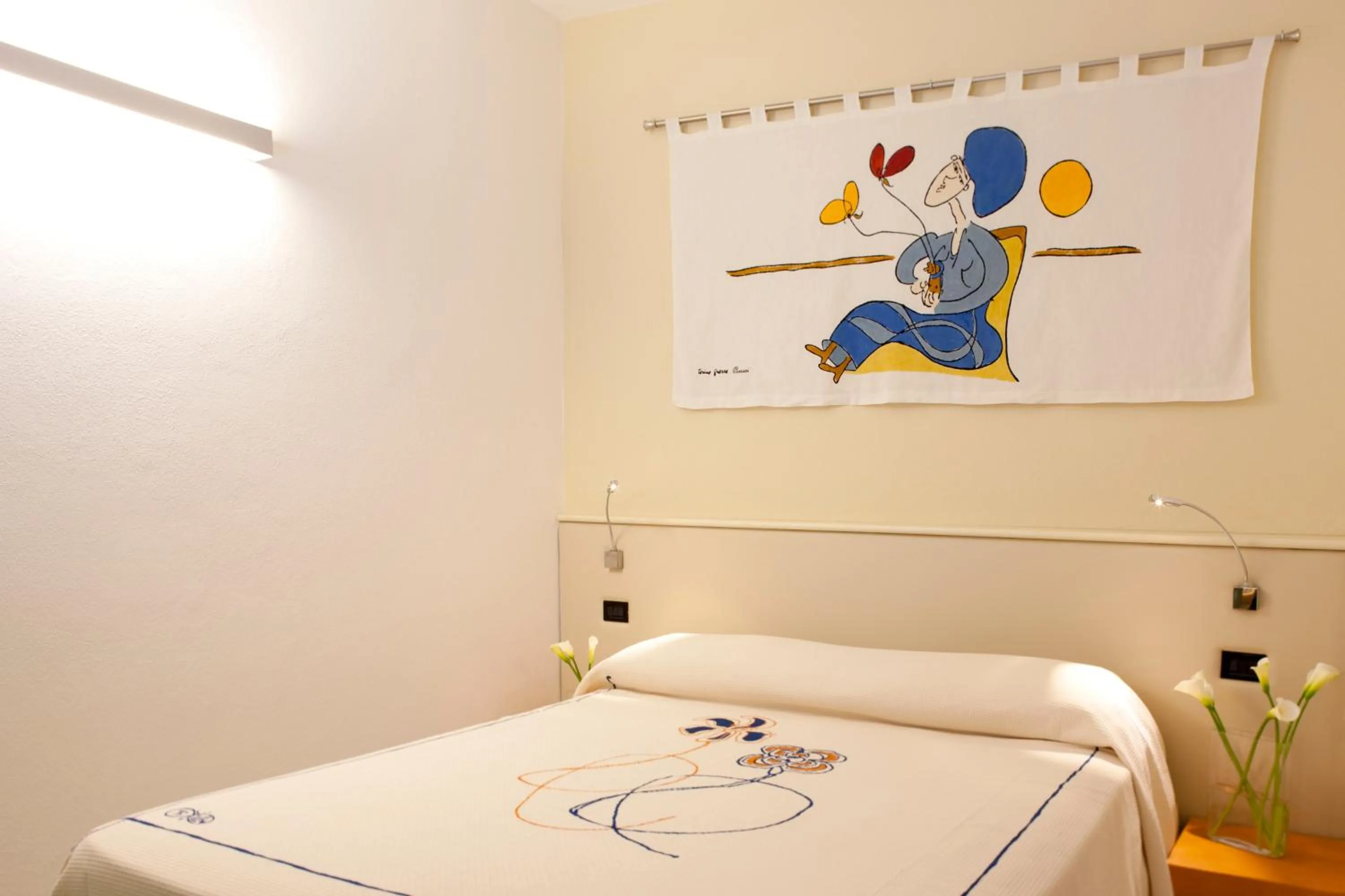 Bed in Hotel Eros Residence