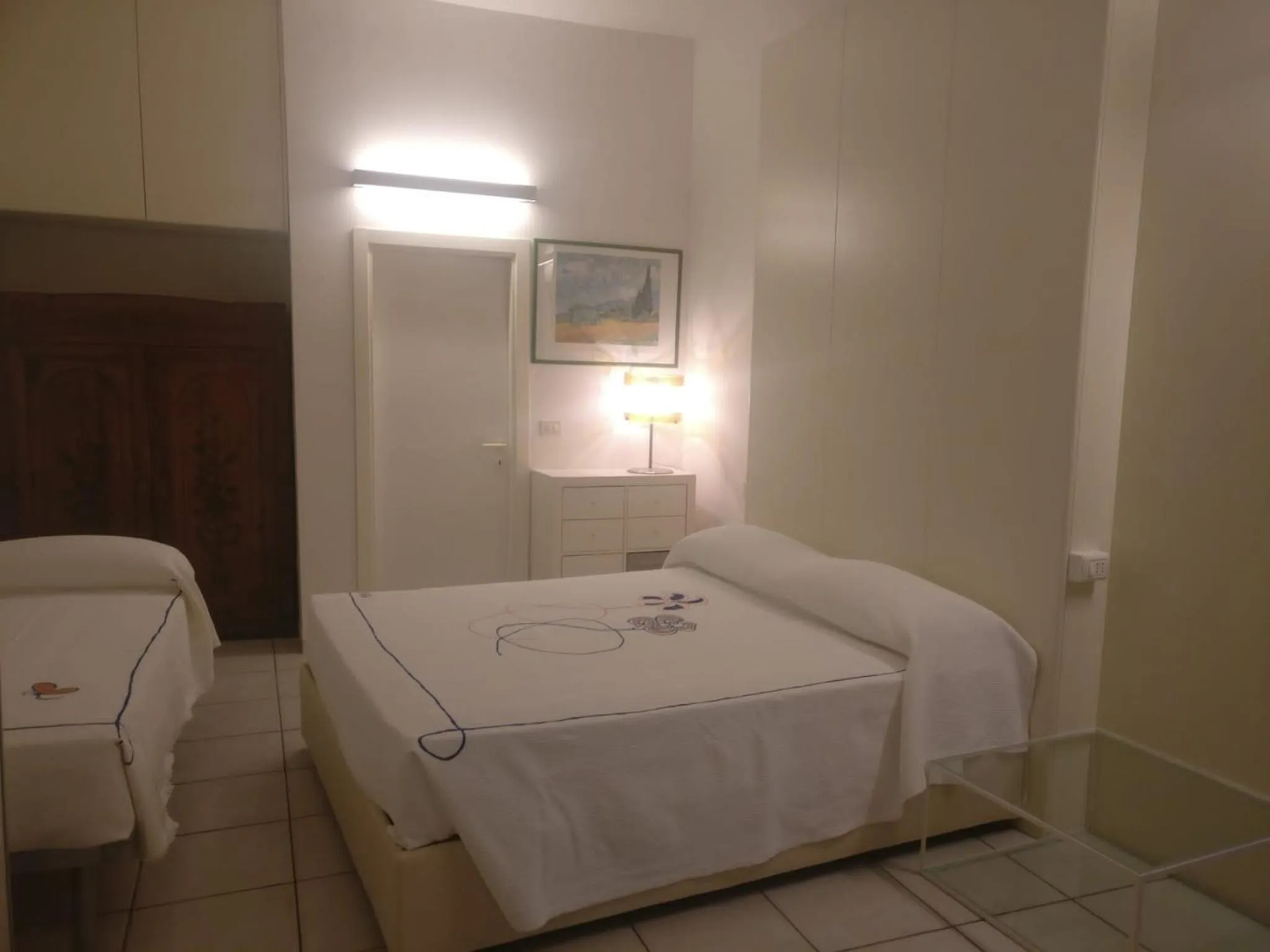 Bed in Hotel Eros Residence