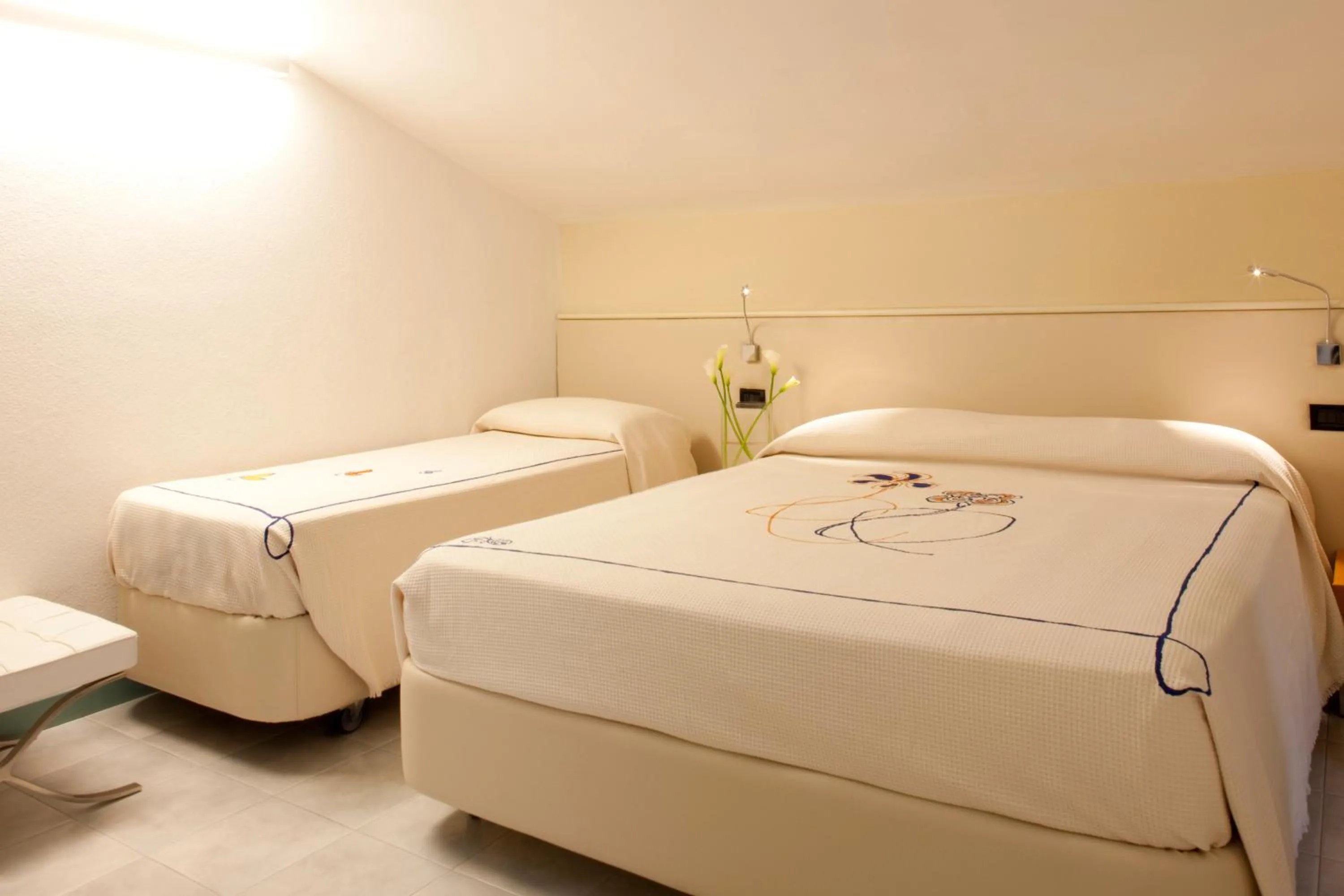 Bed in Hotel Eros Residence