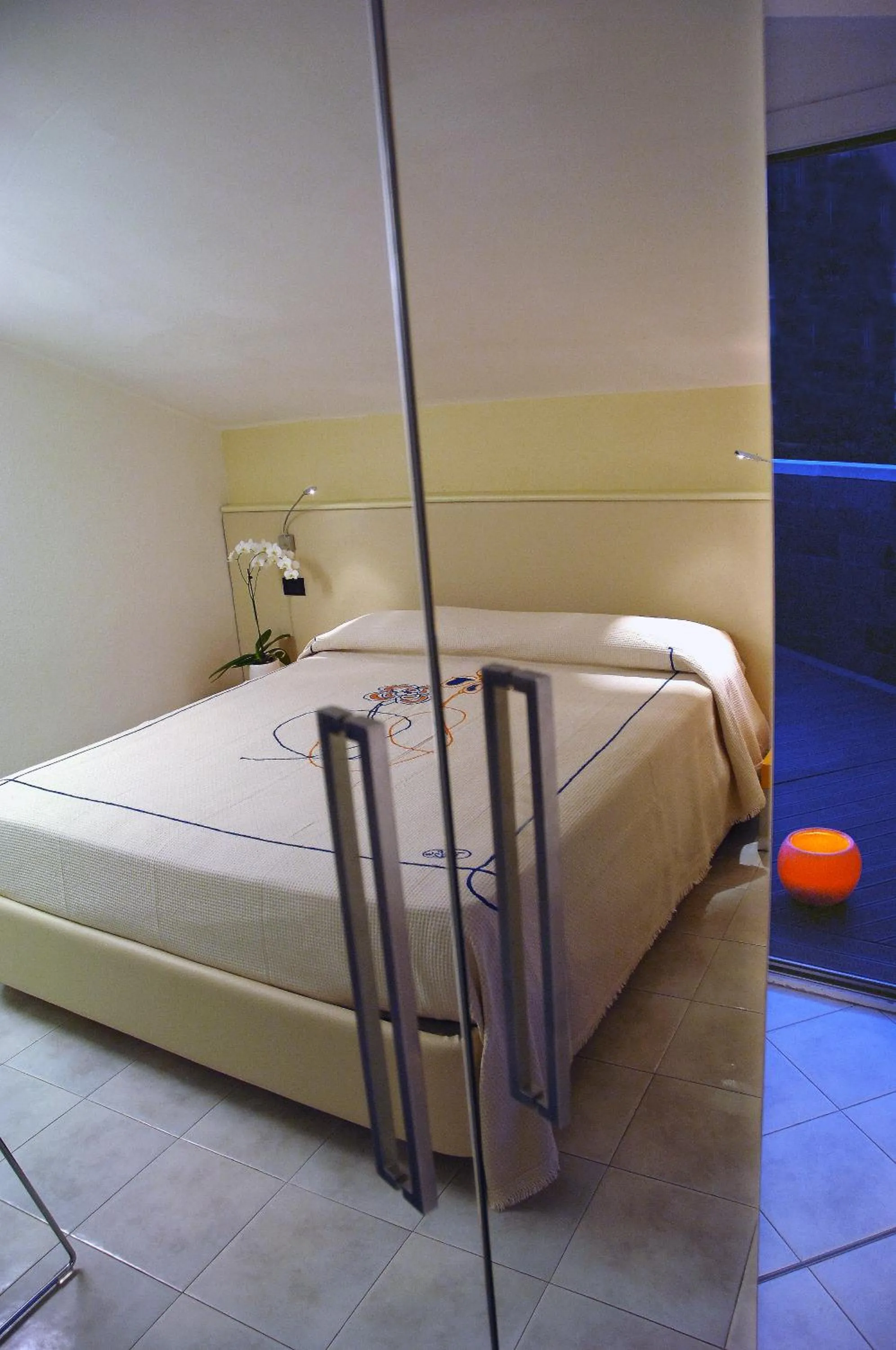 Bed in Hotel Eros Residence