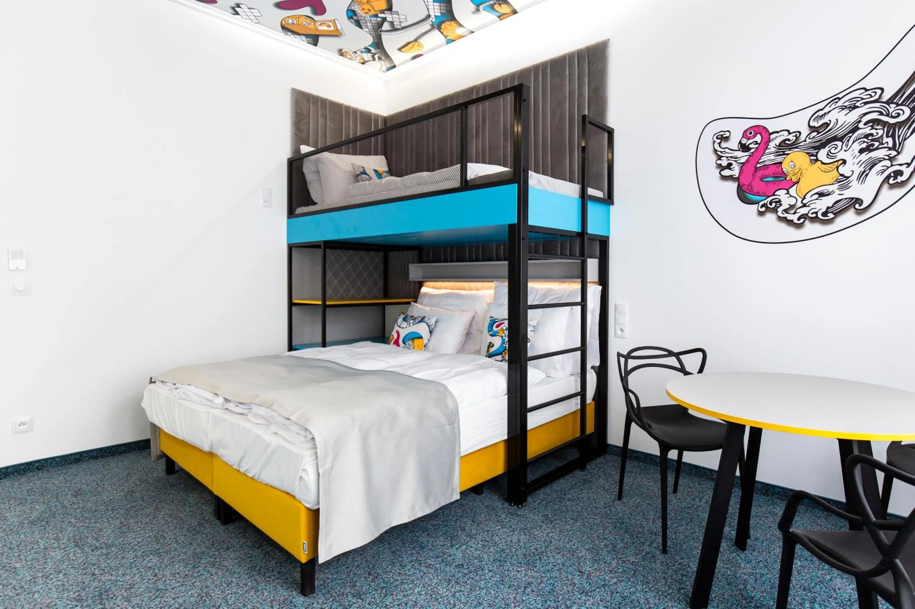 Bed in Family Apartments by ASTORIA Hotel & Medical Spa