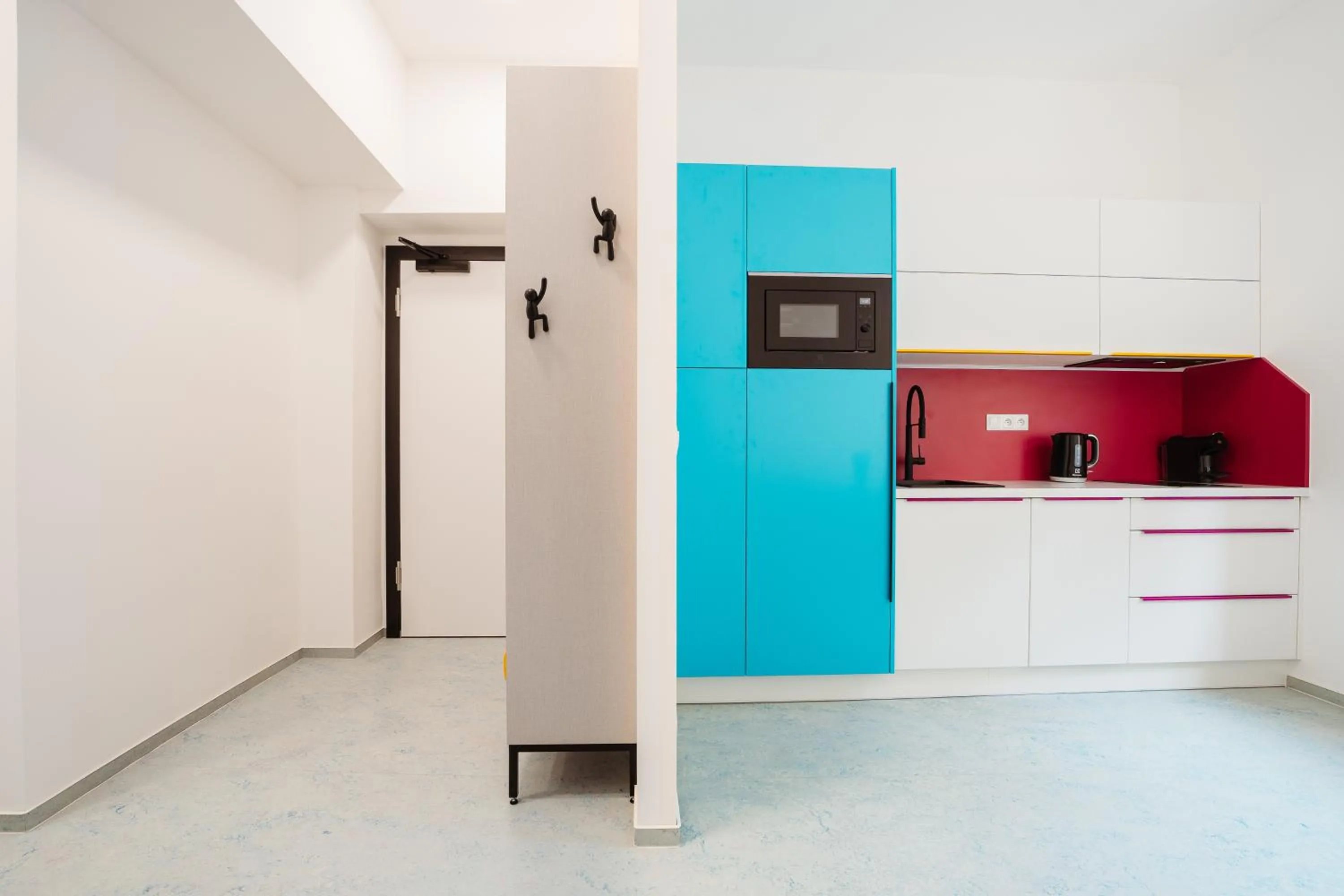 Kitchen or kitchenette in Family Apartments by ASTORIA Hotel & Medical Spa