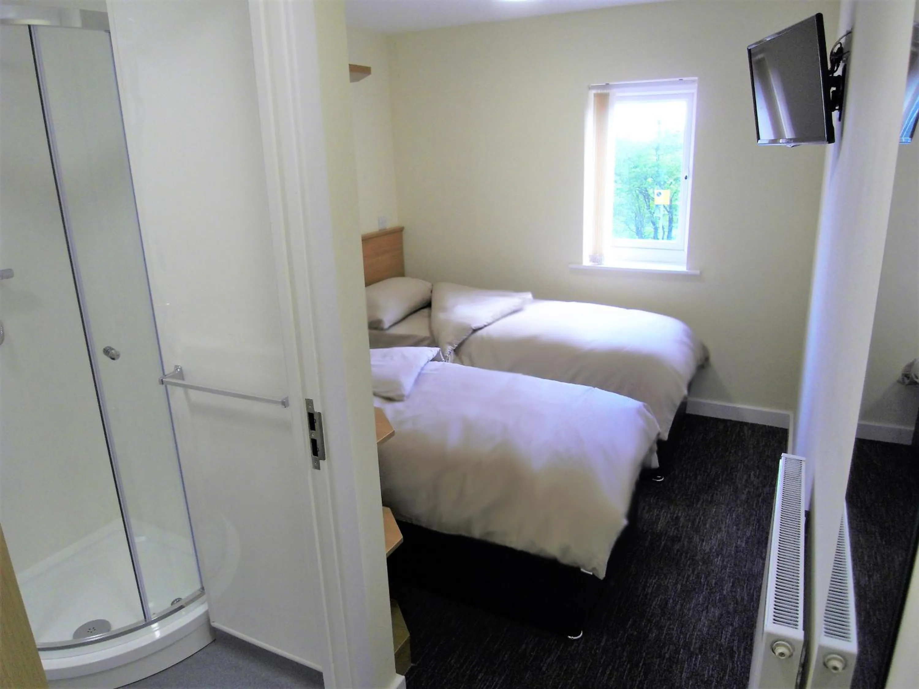 Twin Room in The Stop - Hollies Truckstop Café