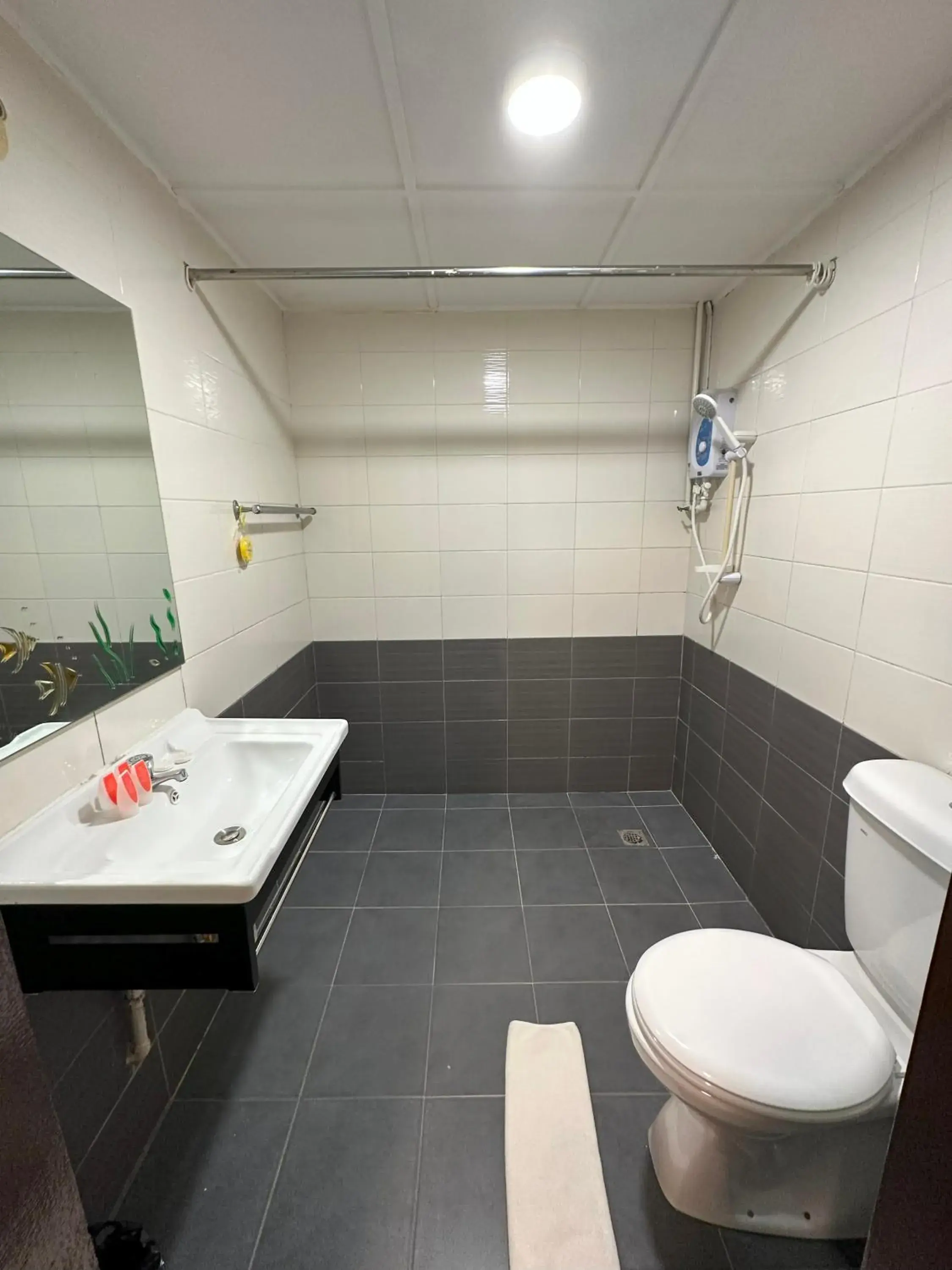 Shower in CU Boutique Hotel Shower in CU Boutique Hotel