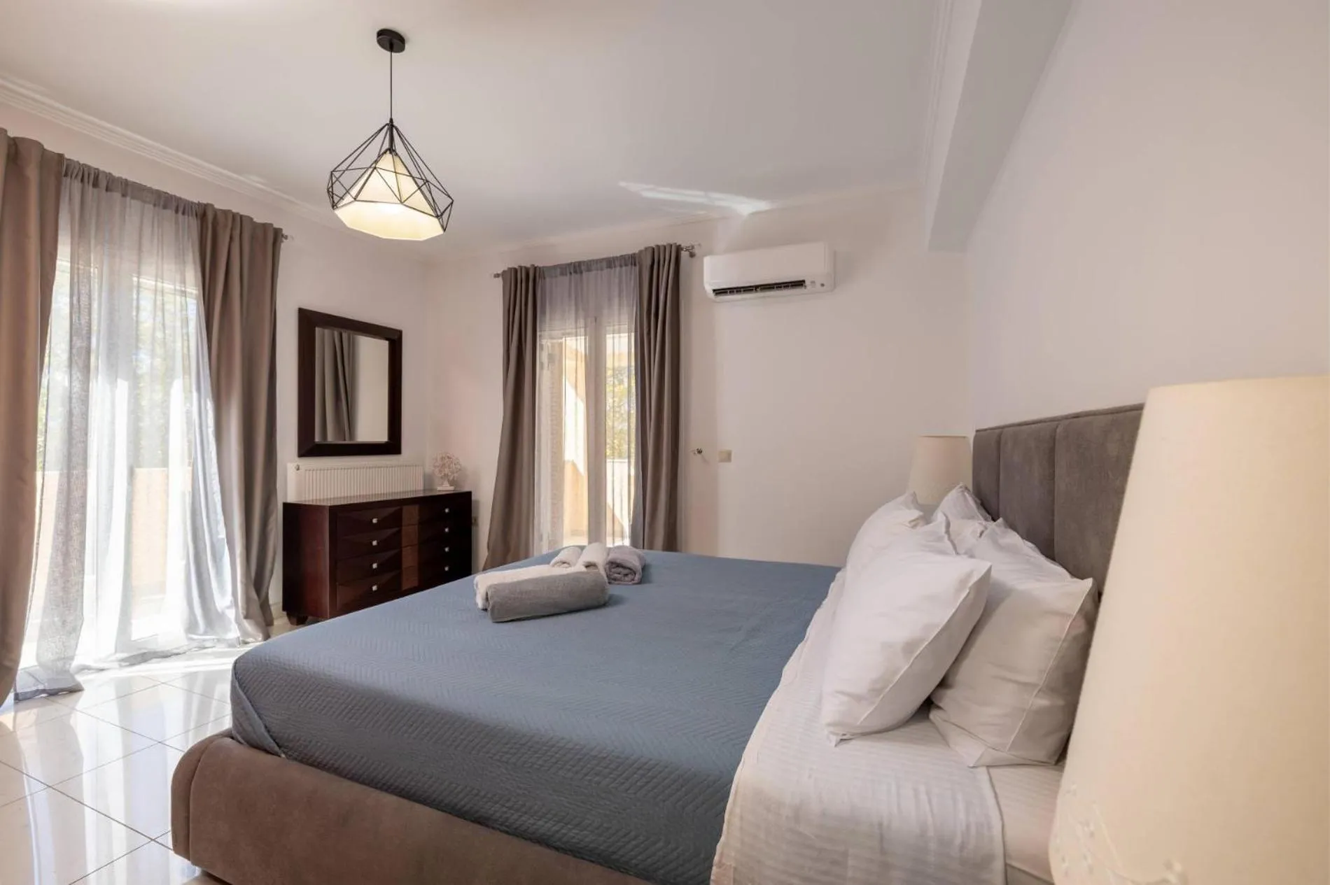 Bed in Leone Luxury Villas