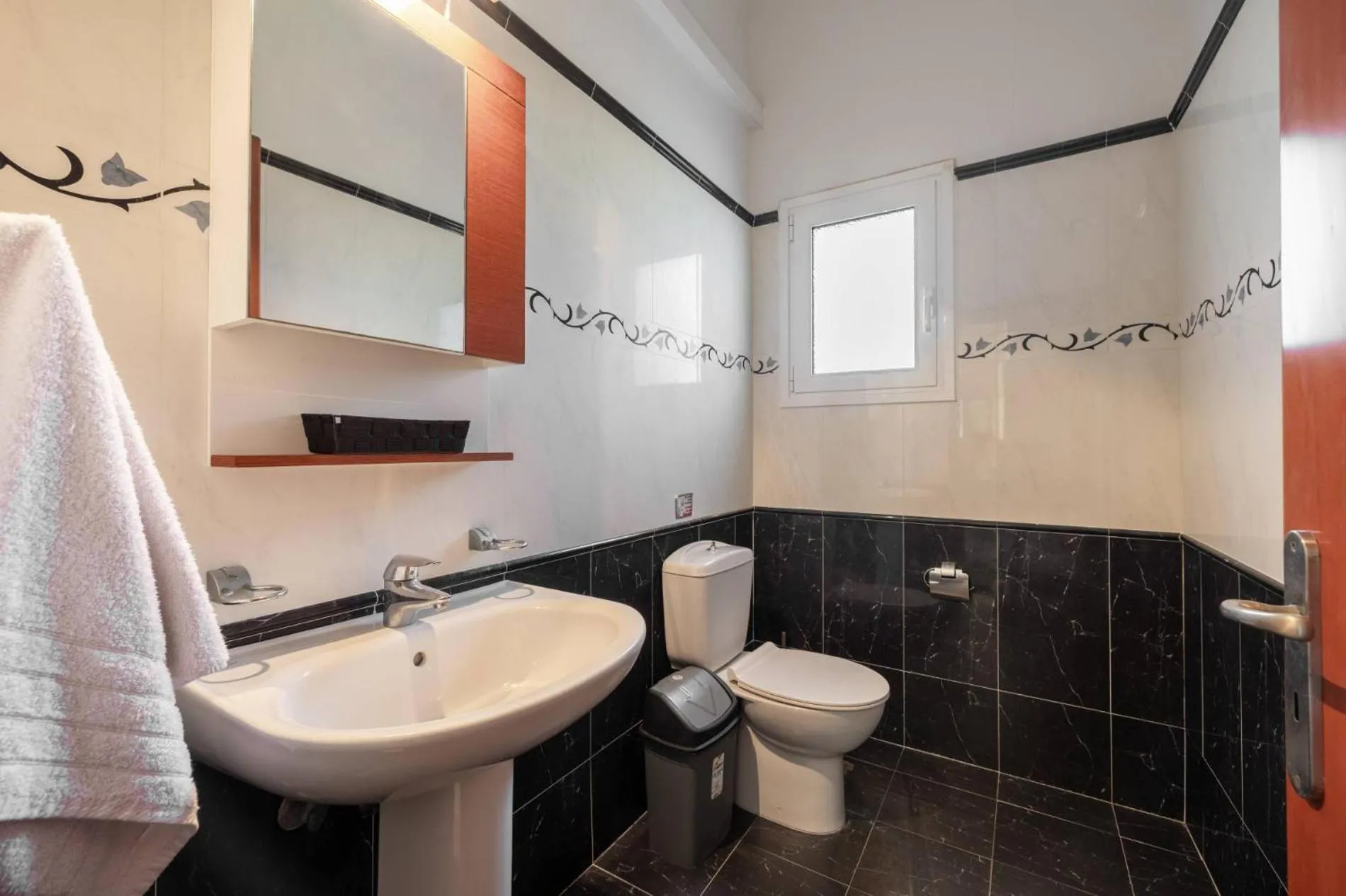 Toilet in Leone Luxury Villas