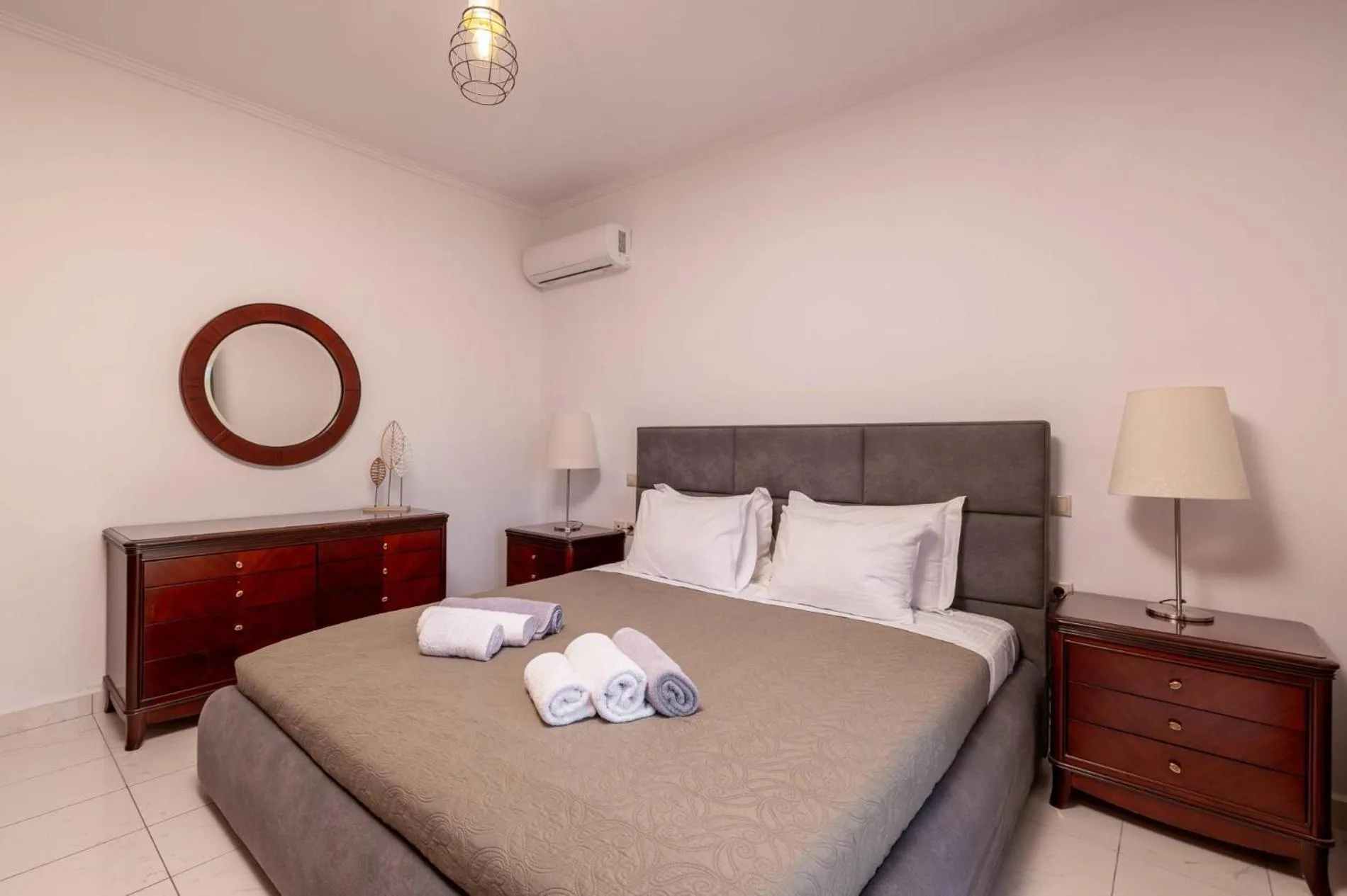 Bed in Leone Luxury Villas