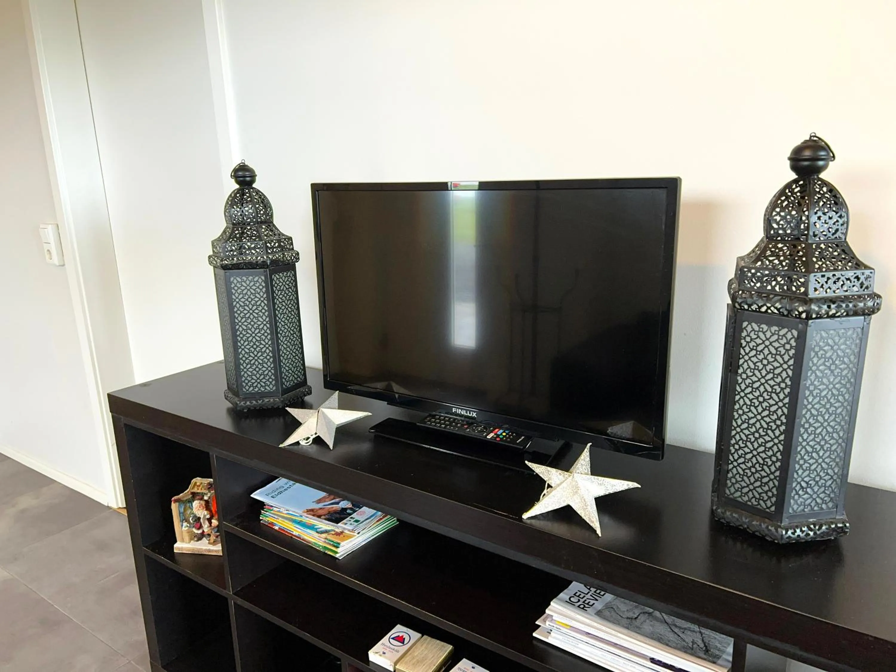 TV and multimedia in Bakland ad Lágafelli Apartment