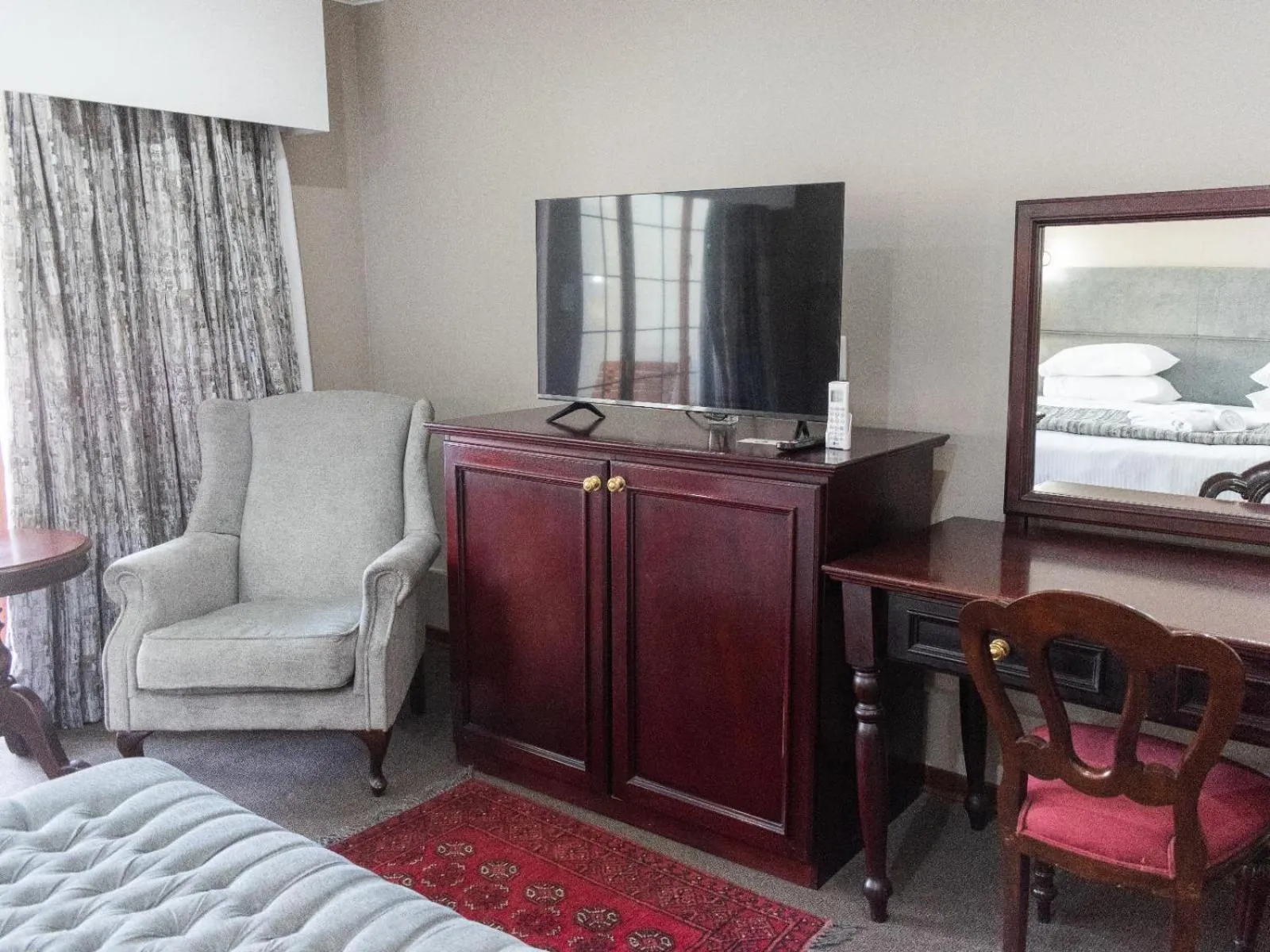 Living room, Bed in Aanmani Rose Guesthouse