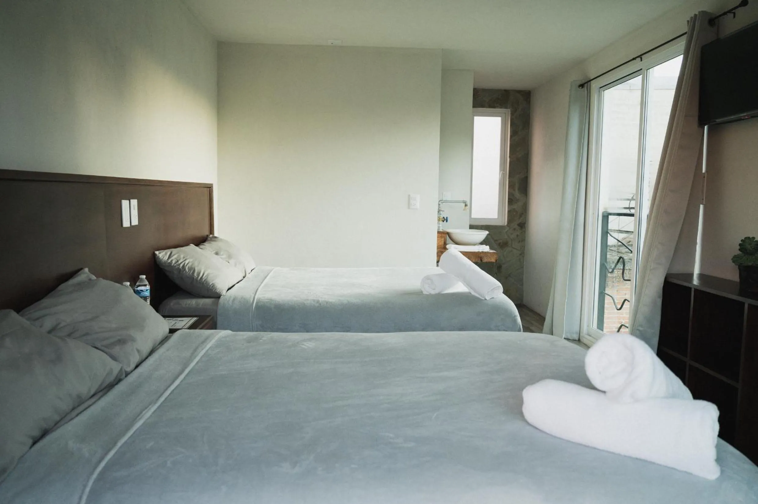 Photo of the whole room, Bed in JH Hotel Tlatlauqui