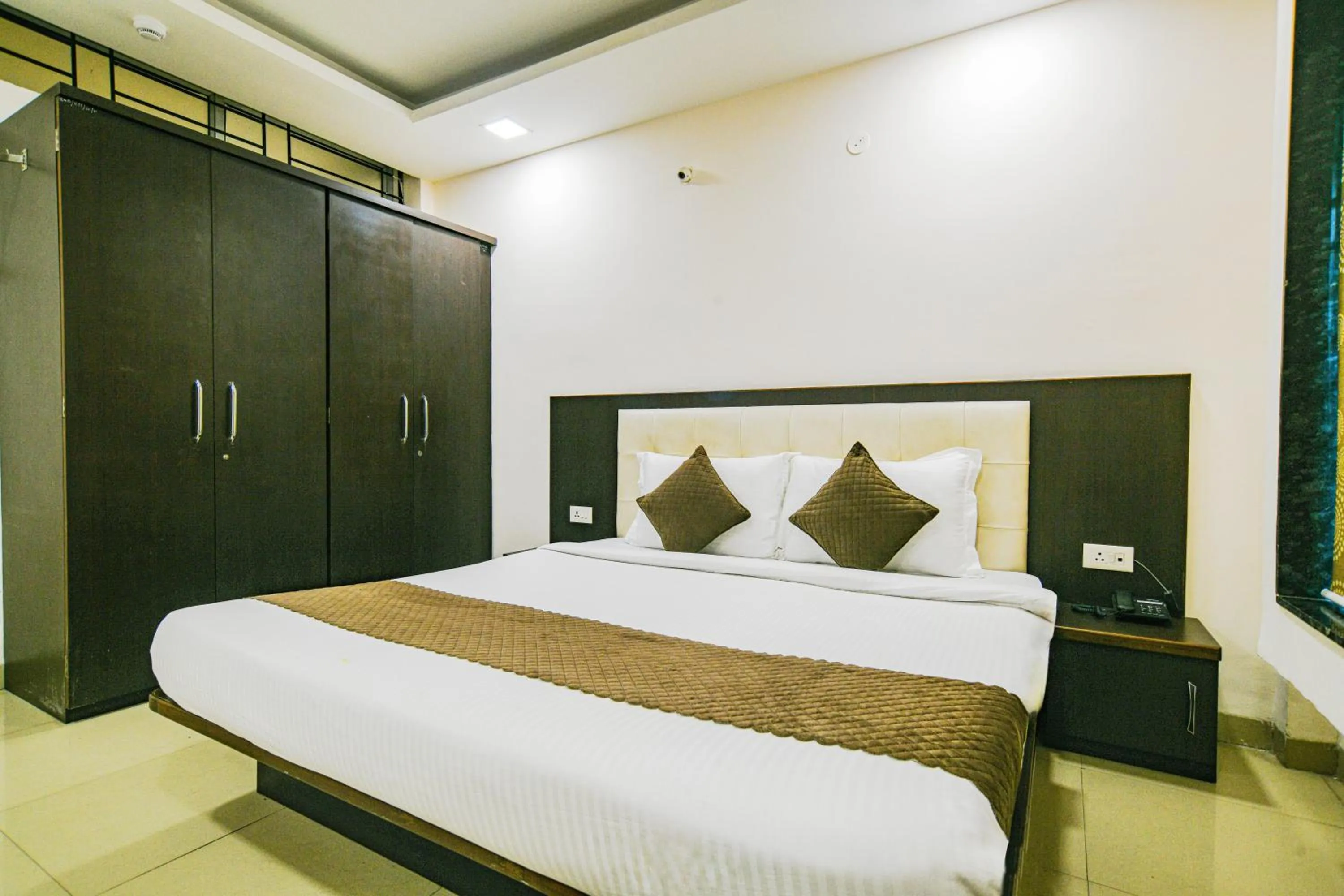 Bed in Hotel Shri Ramkrishna Bagh Palace by M Square