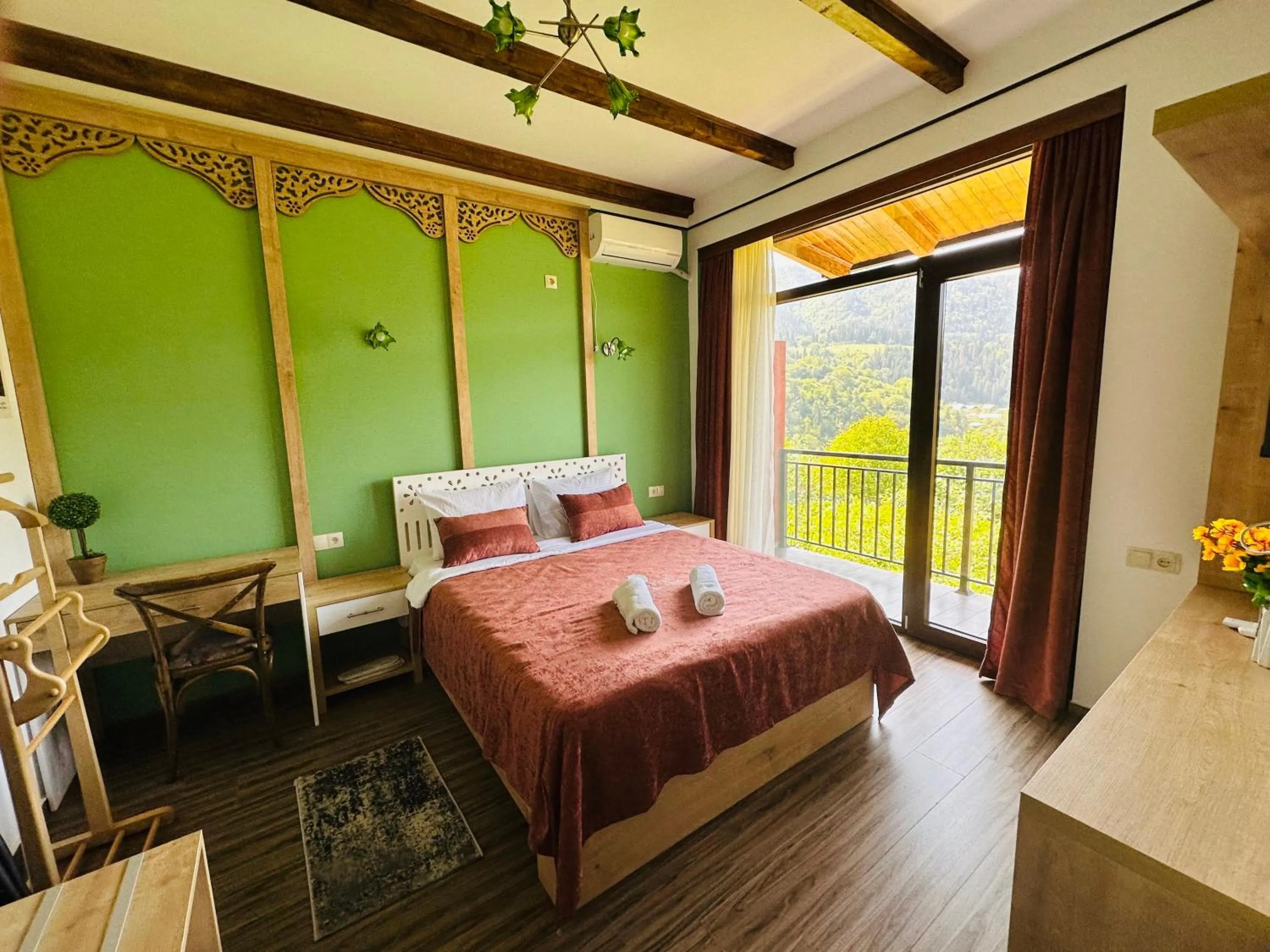 Bed in Pesvebi Design Hotel and Cellar