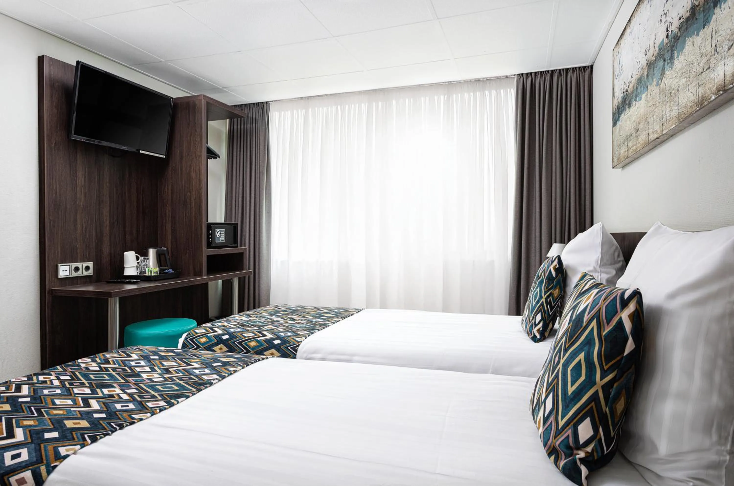 Bed in Hotel Damsquare