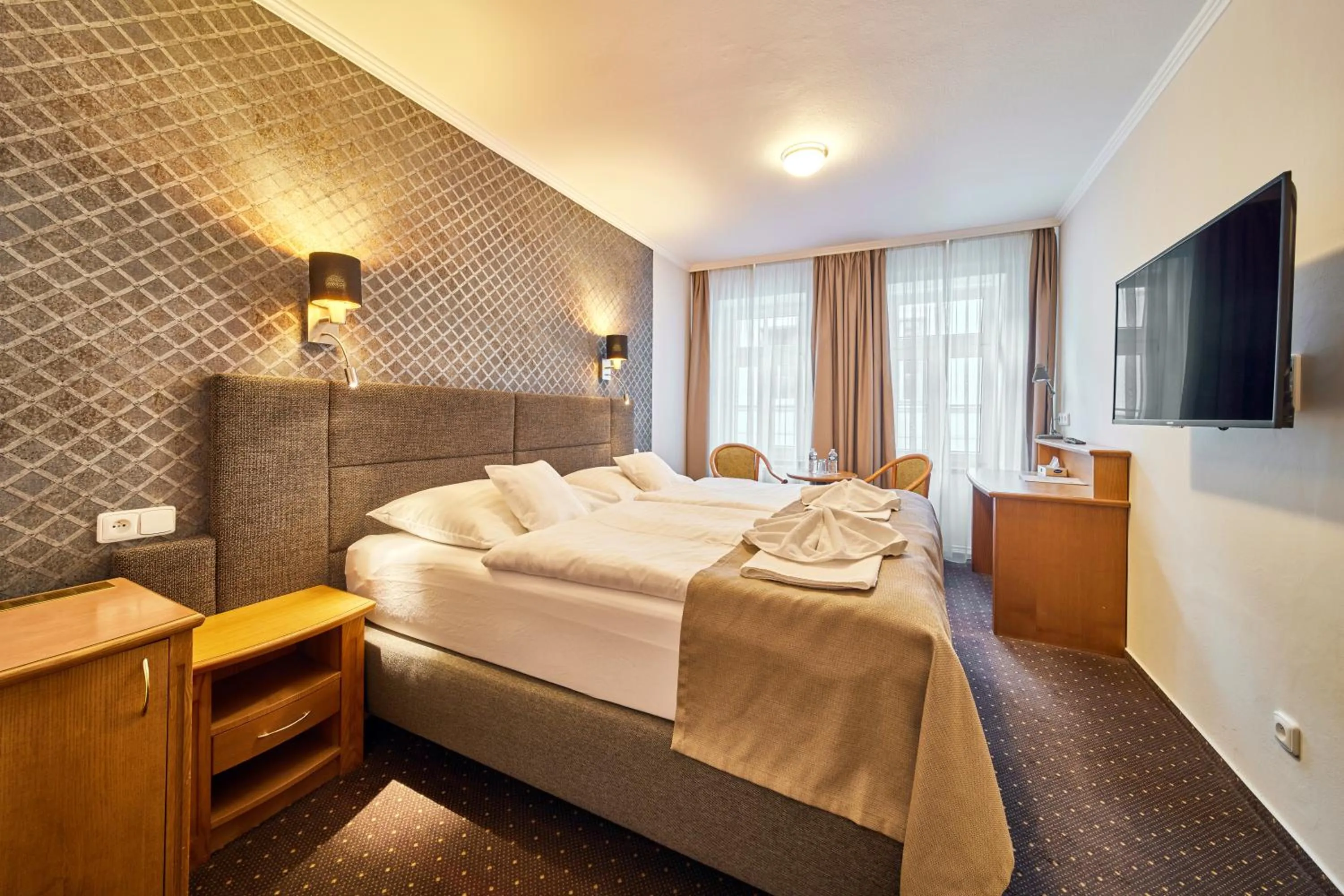 Bed in Hotel Adam Trutnov