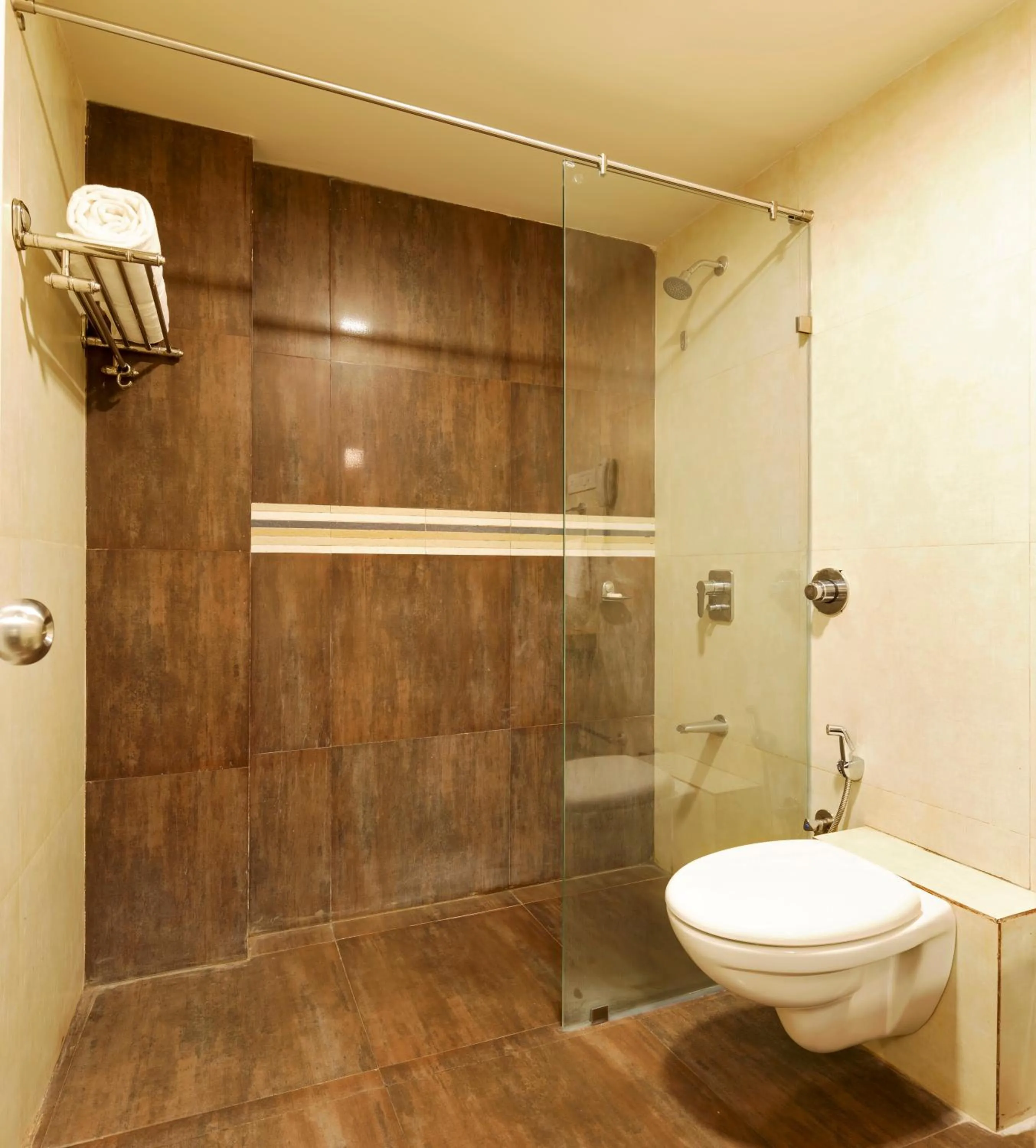 Bathroom in Regenta Place Raysons Kolhapur