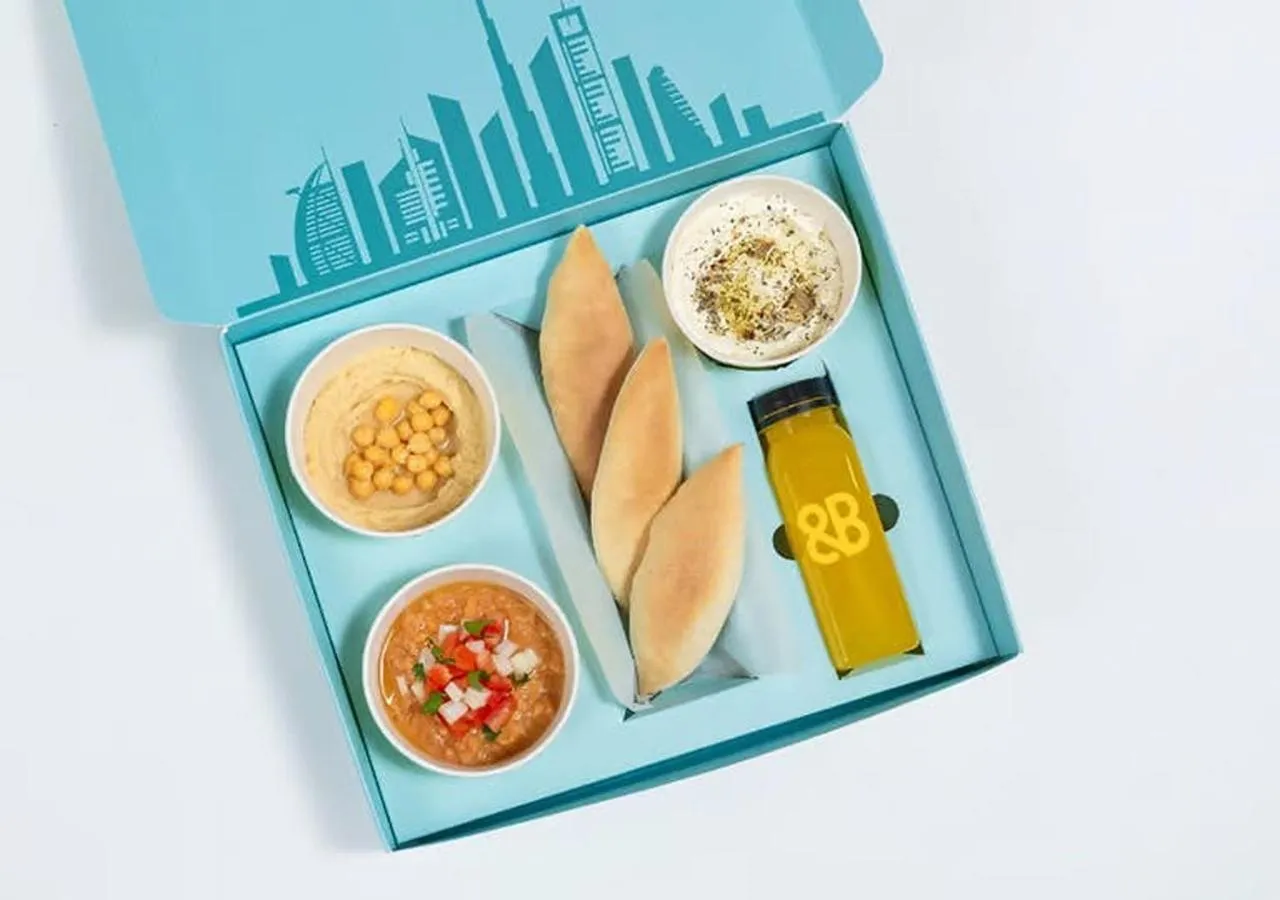 Food and drinks in Cosmos Living Dubai Arch Tower Pool, Gym & Balcony