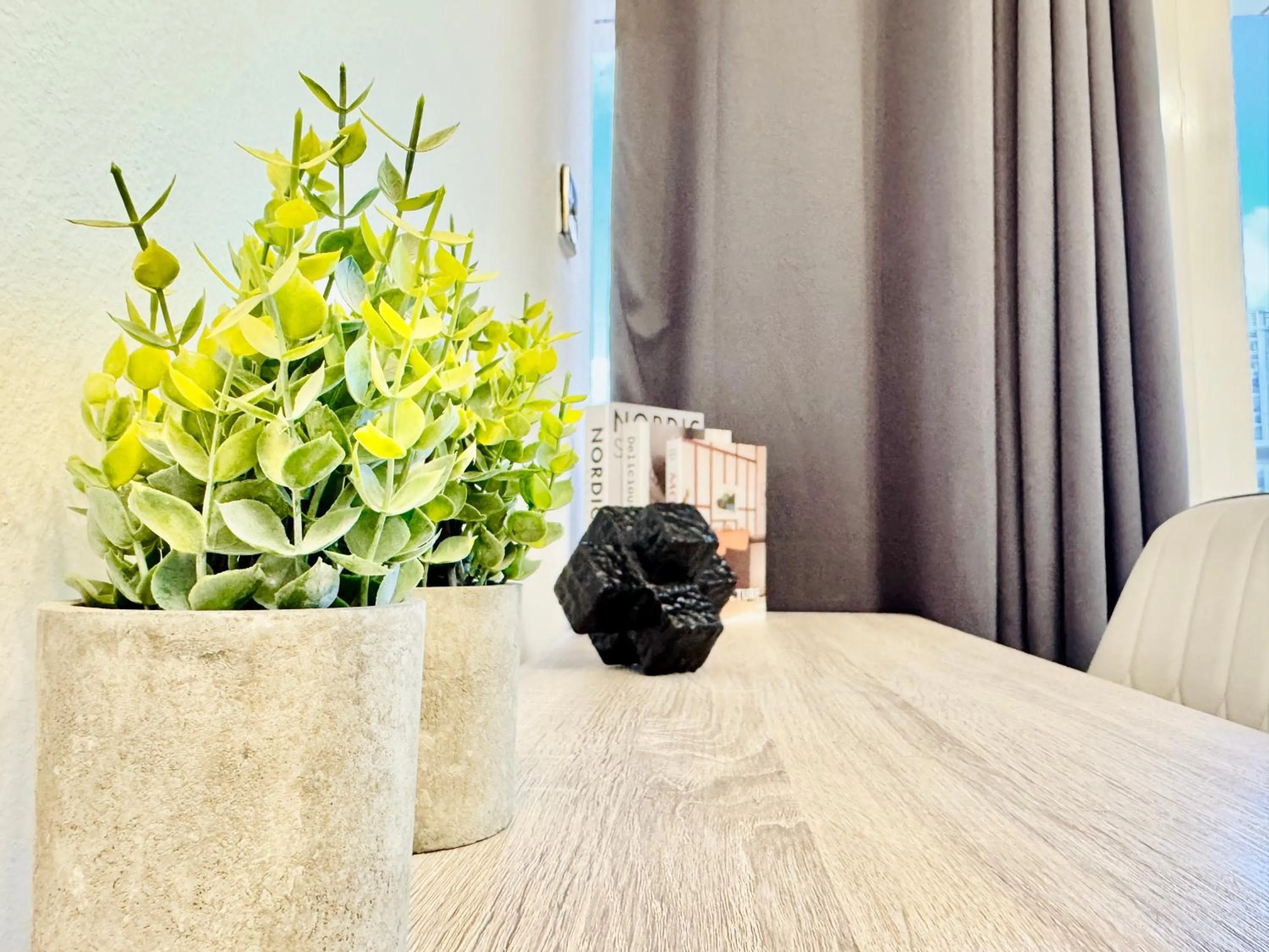 Dining area in Cosmos Living Dubai Arch Tower Pool, Gym & Balcony