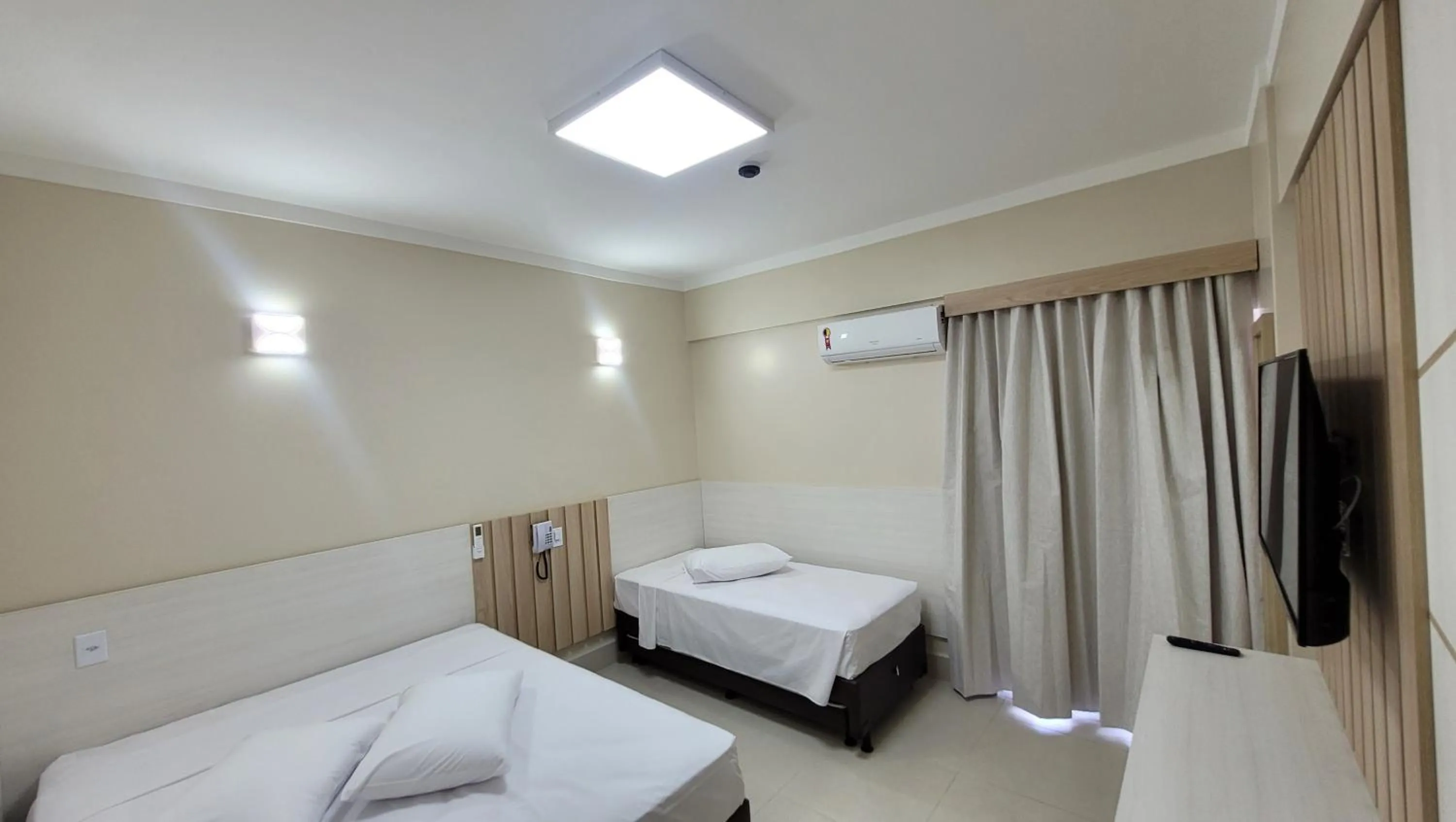 Bed in Spazzio Diroma Hospedagem com acesso gratuito no Acqua Park