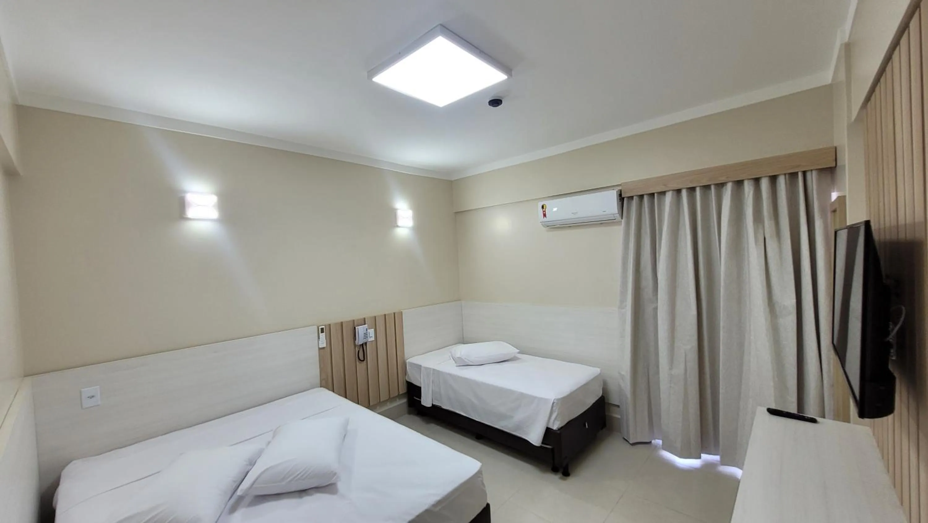 Bed in Spazzio Diroma Hospedagem com acesso gratuito no Acqua Park