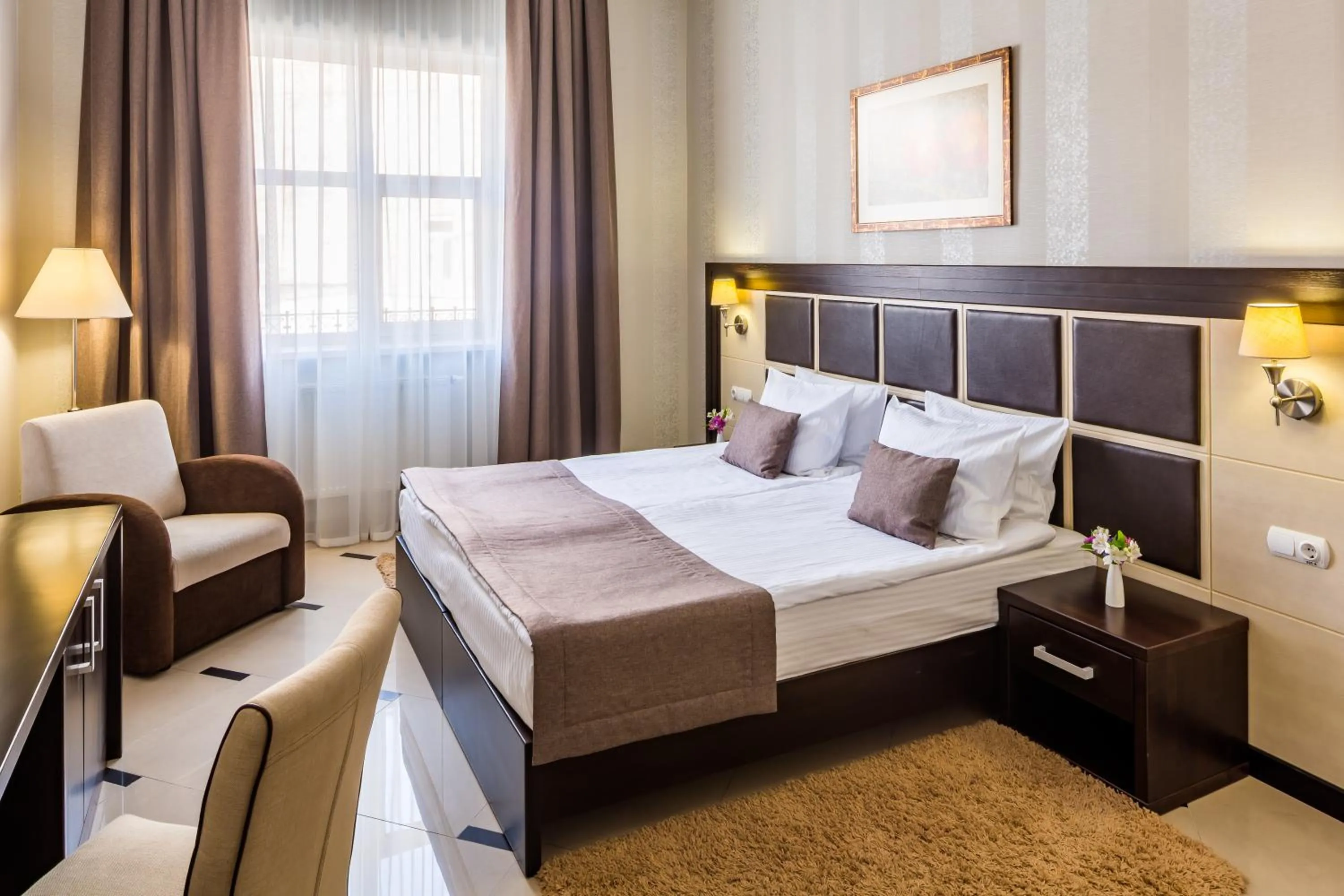 Bed in Taurus Hotel & SPA