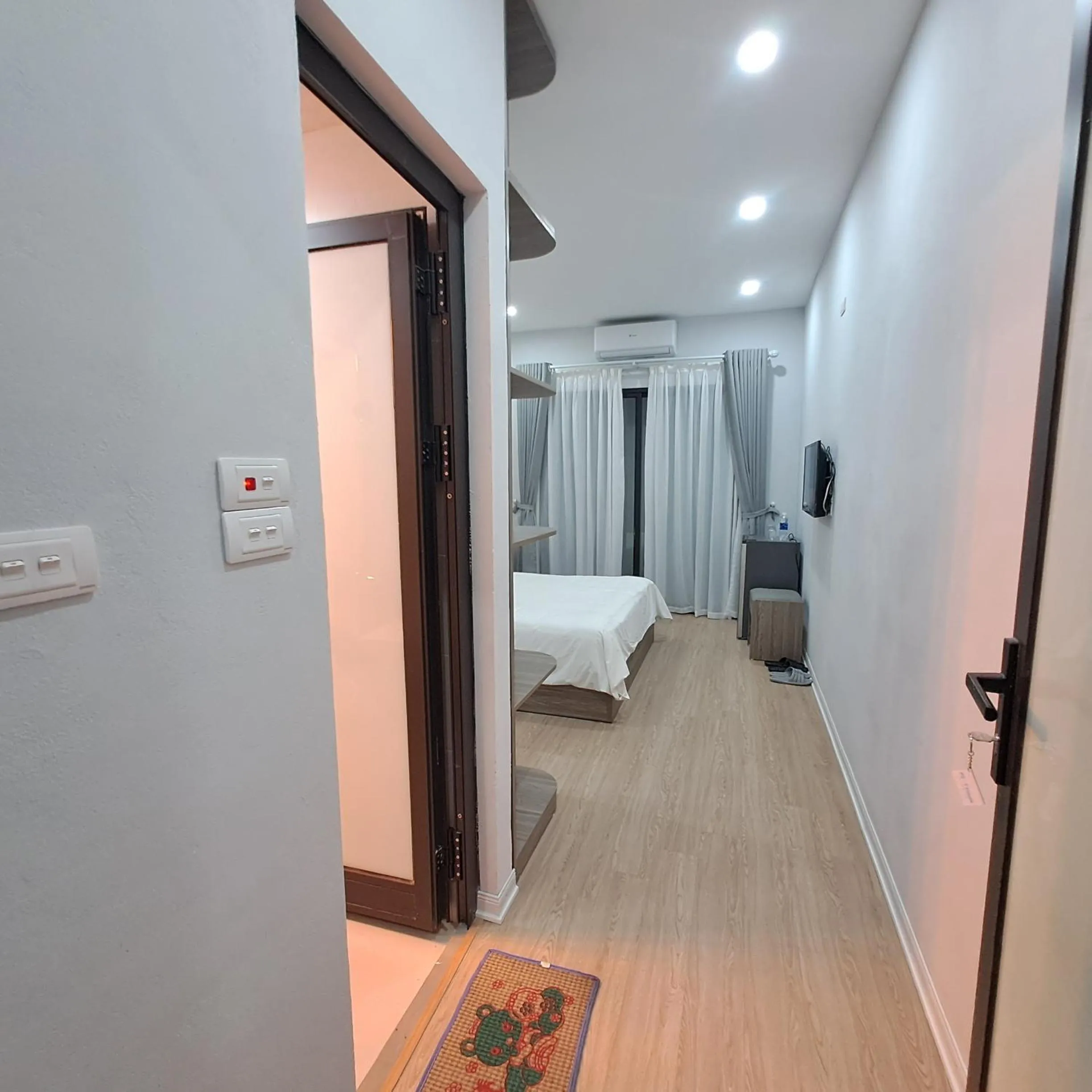 Photo of the whole room, Bed in Blue Homestay Cau Giay