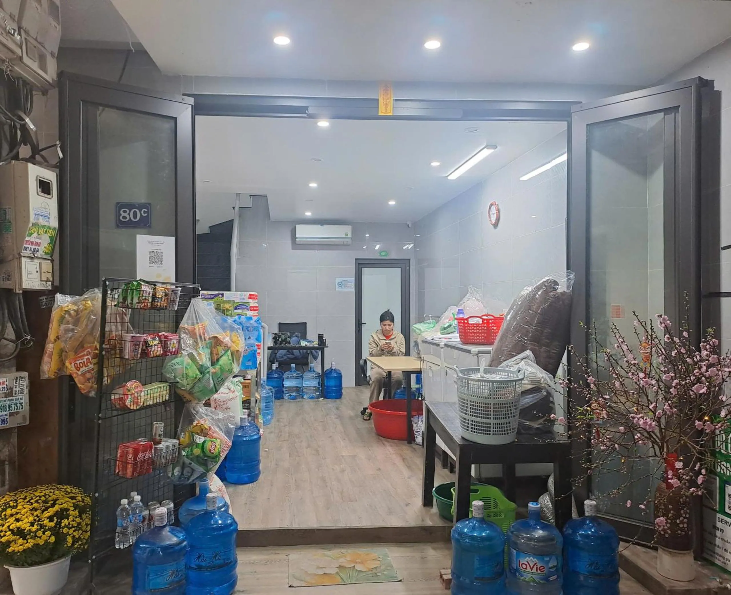 Staff in Blue Homestay Cau Giay