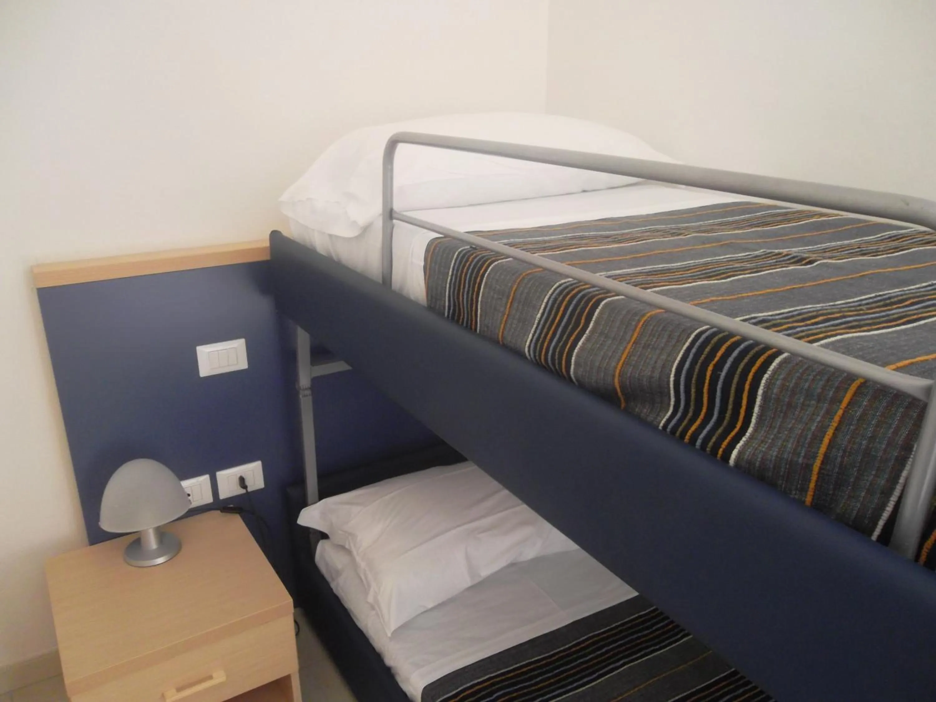 Bed in Hotel Quattro Palme