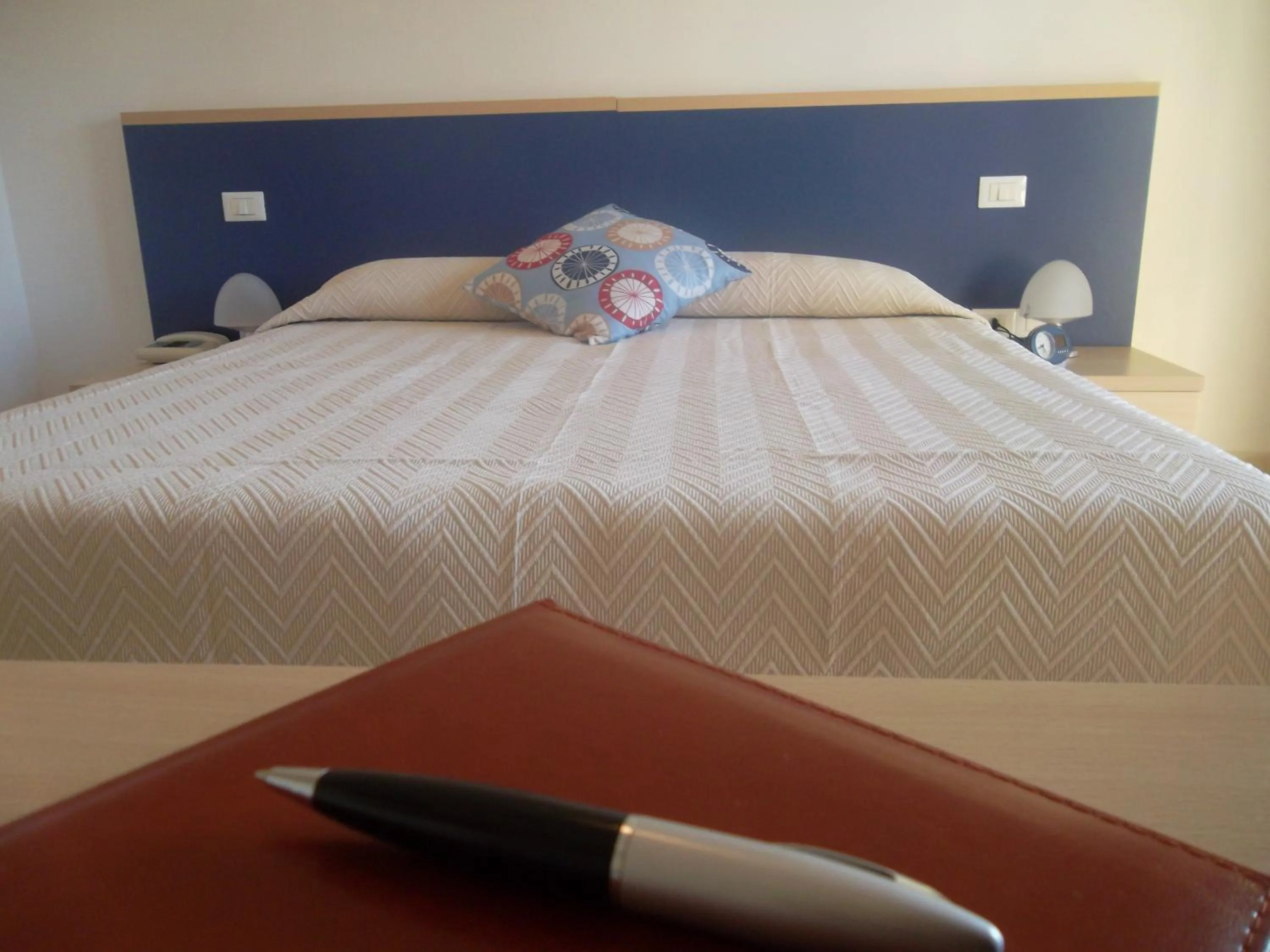 Bed in Hotel Quattro Palme