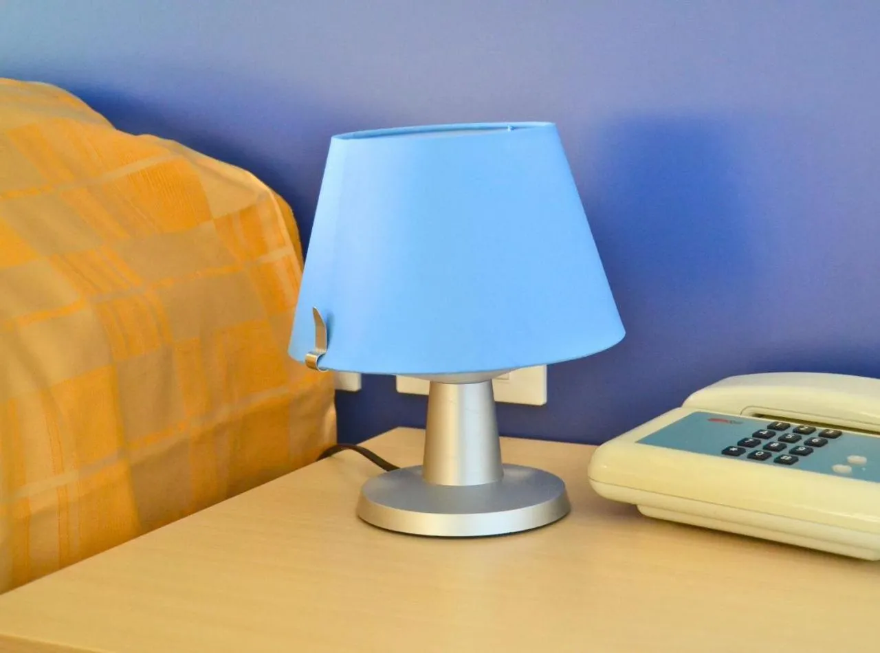 Bedroom in Hotel Quattro Palme