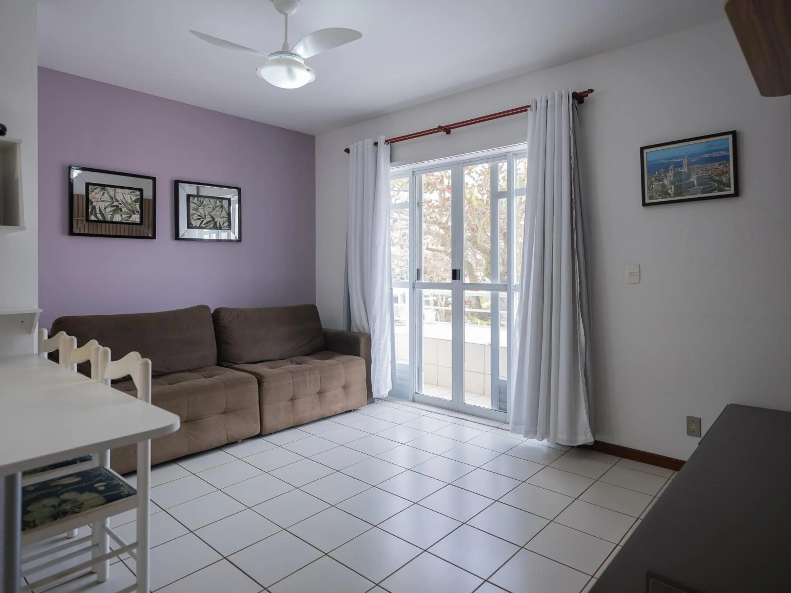 Communal lounge/ TV room in Pousada Kindermann - Jurerê