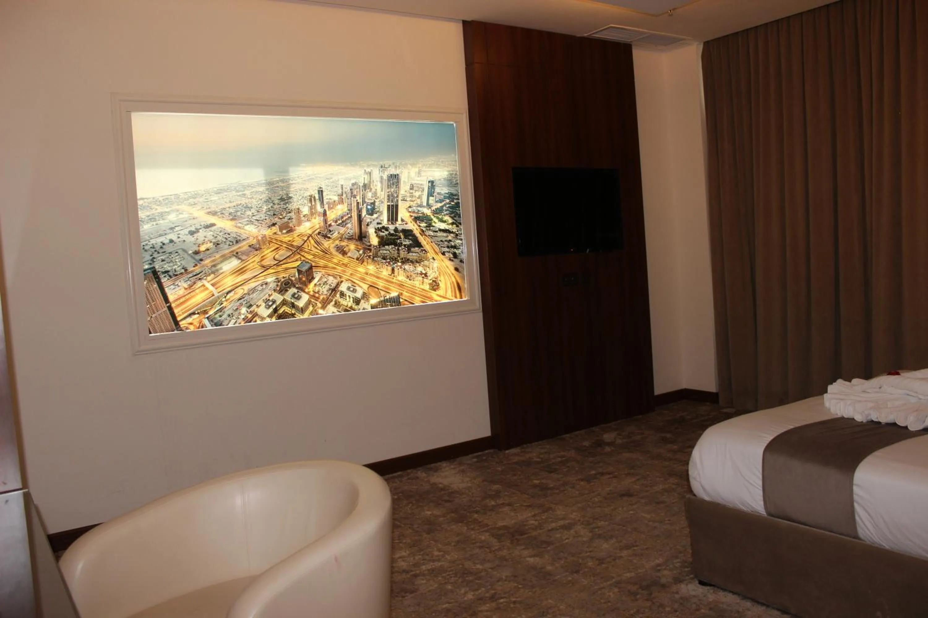 Bed in Dolphin Continental Hotel