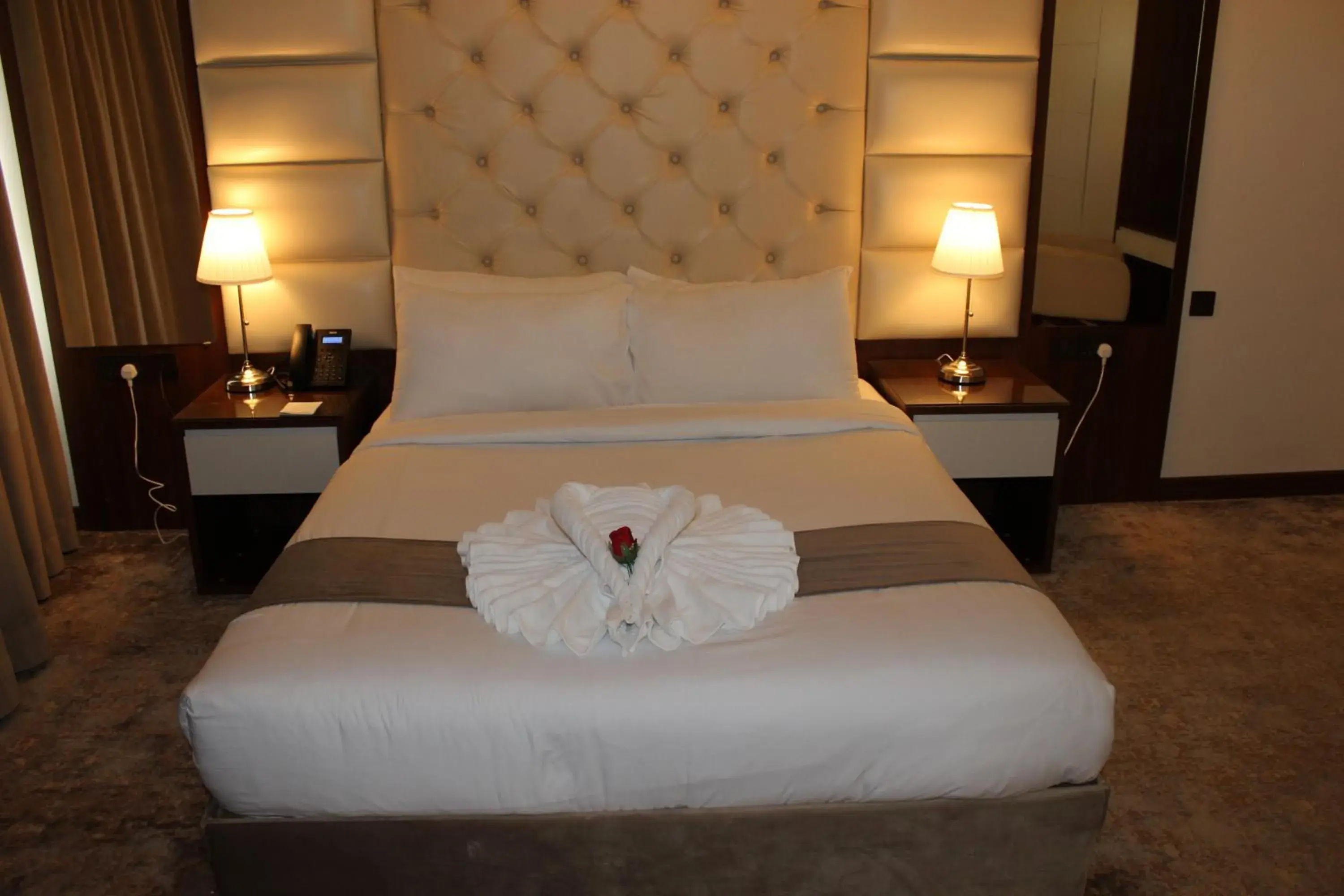 Bed in Dolphin Continental Hotel Bed in Dolphin Continental Hotel