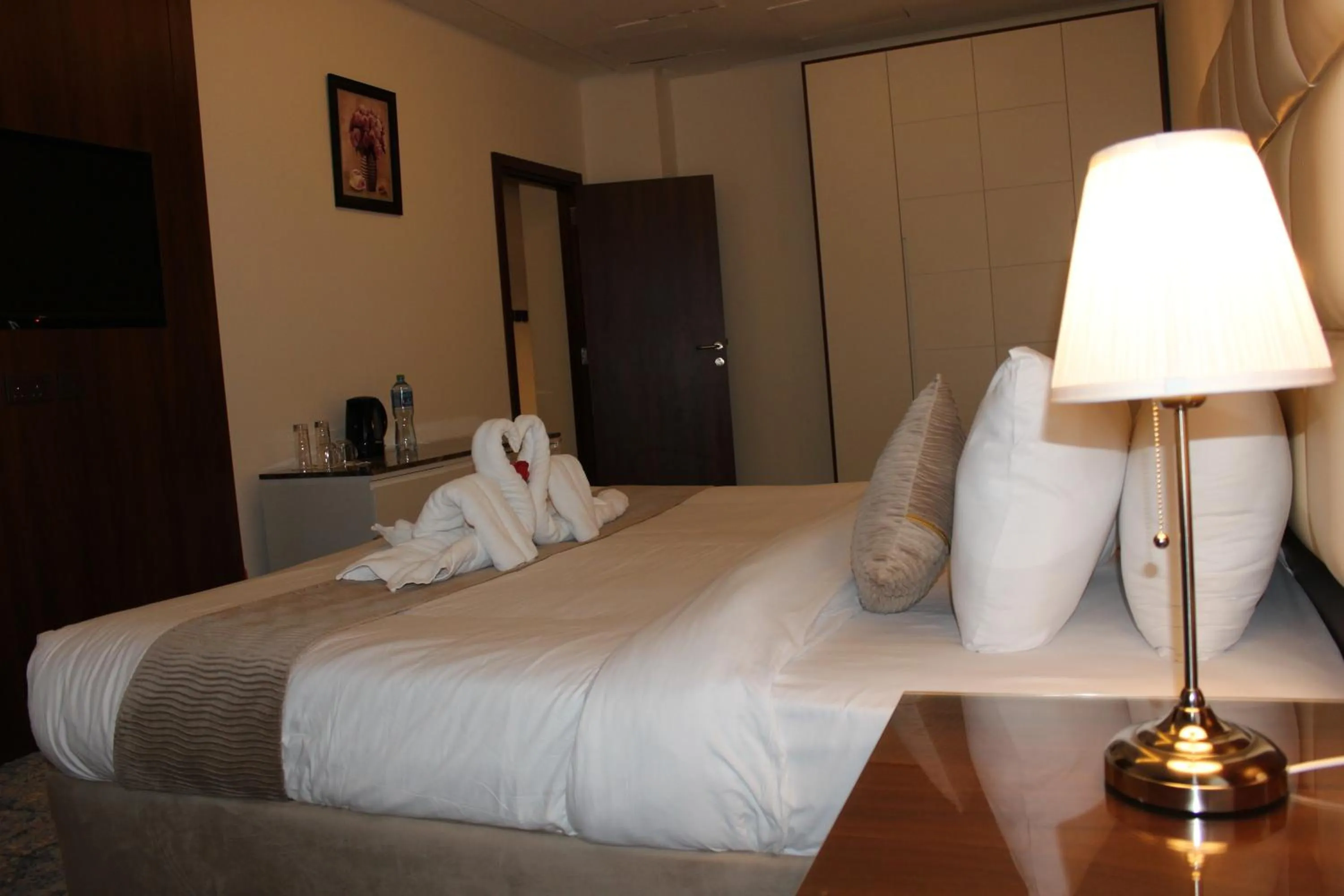 Bed in Dolphin Continental Hotel