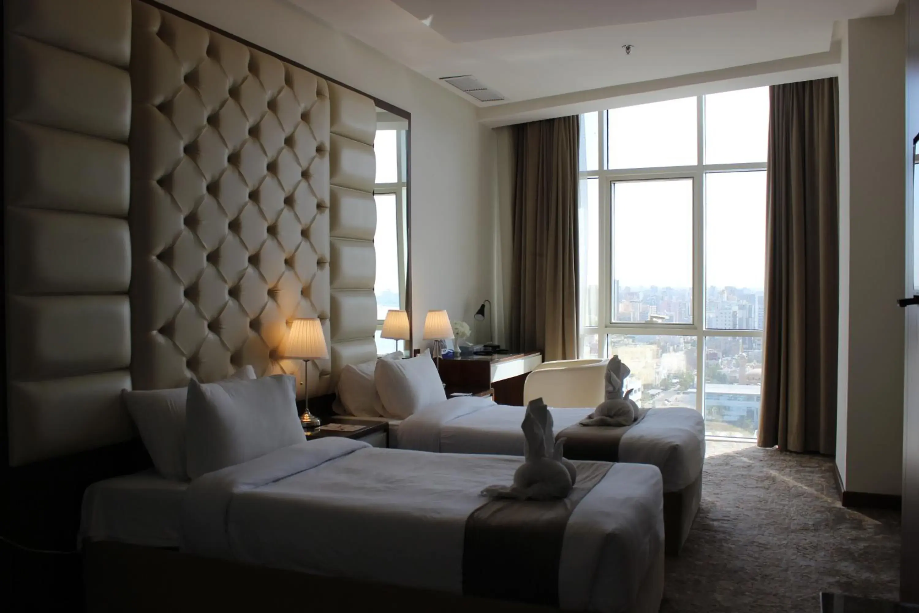 Bed in Dolphin Continental Hotel Bed in Dolphin Continental Hotel