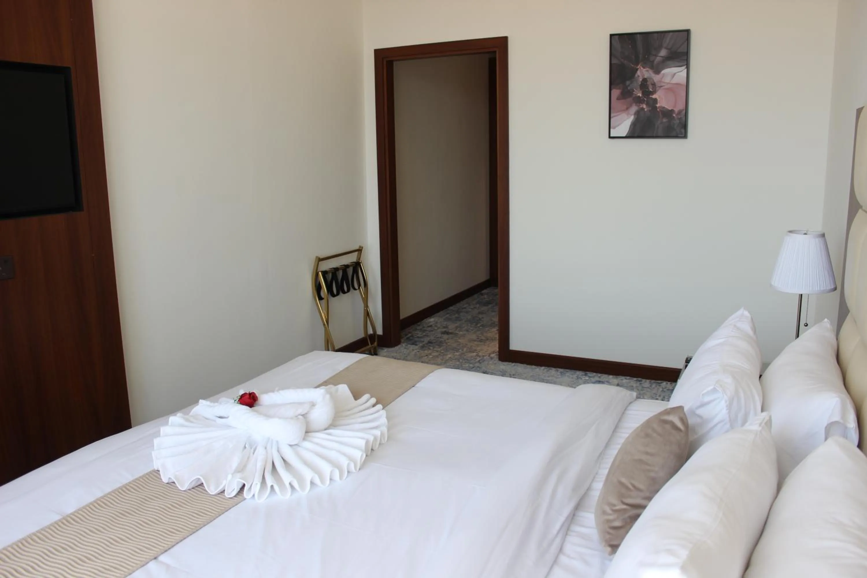 Bed in Dolphin Continental Hotel