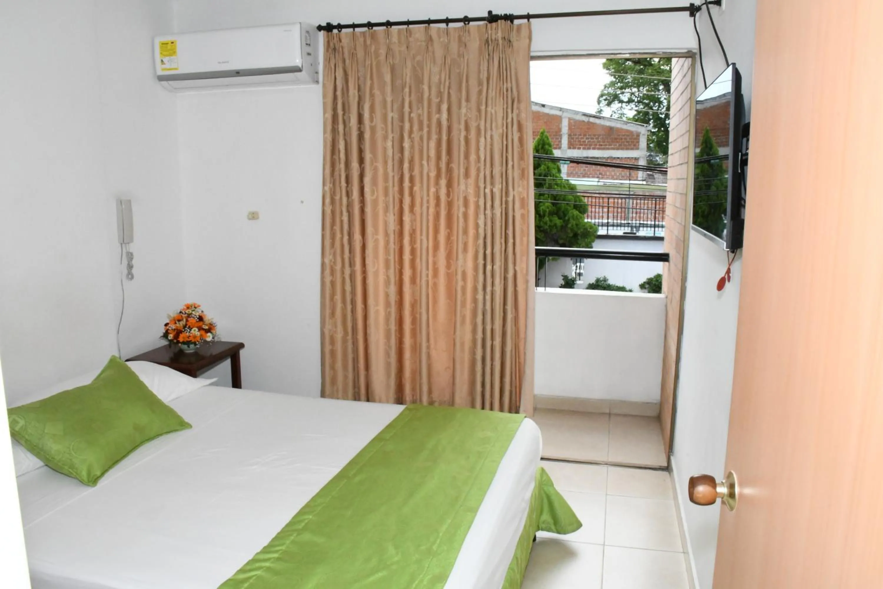 Bed in Apartahotel Los Cerezos