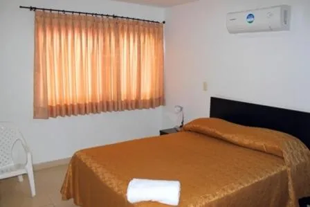 Bed in Apartahotel Los Cerezos